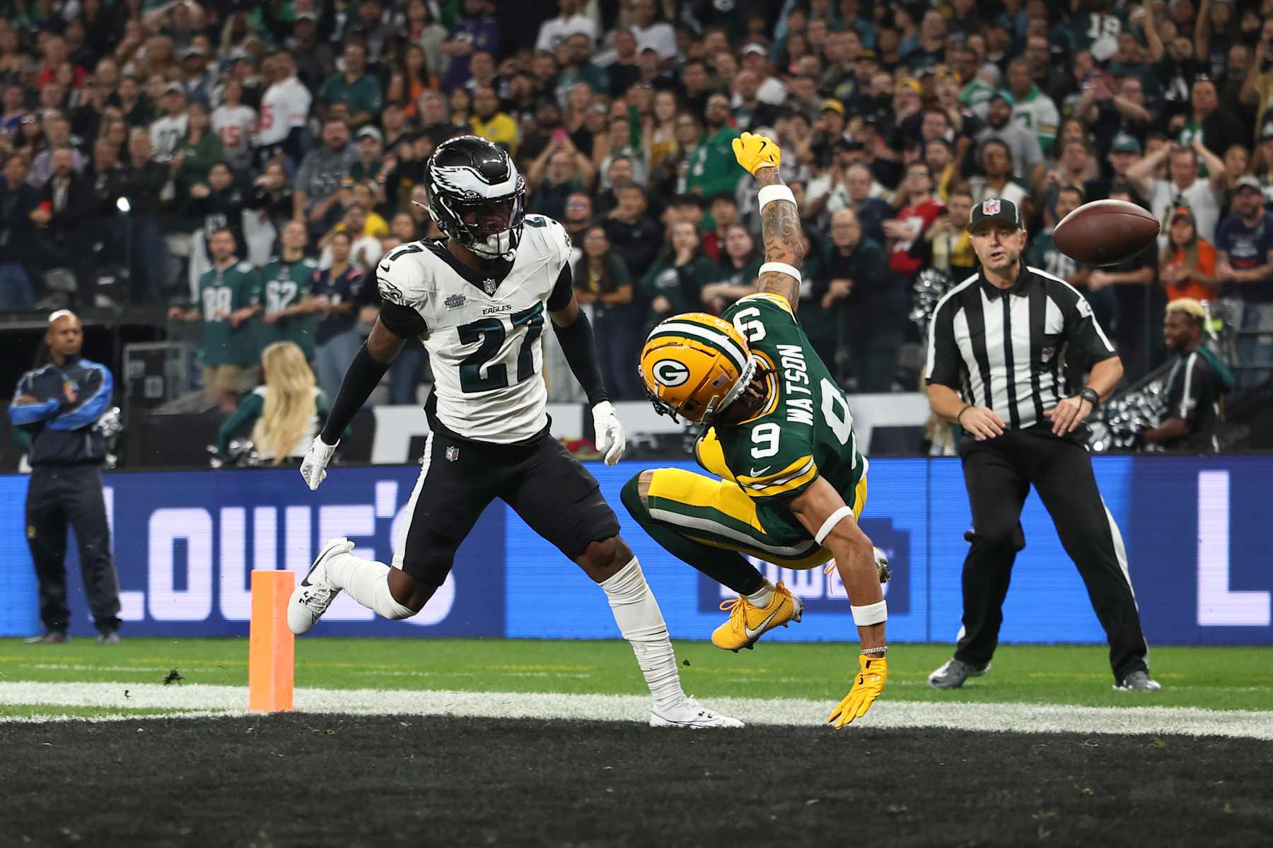 SÃO PAULO, BRAZIL - SEPTEMBER 6: Wide receiver Christian Watson #9 of the Green Bay Packers misses a touchdown catch under tight coverage by cornerback Quinyon Mitchell #27 of the Philadelphia Eagles during the first quarter of an NFL football game, at Arena Corinthians on September 6, 2024 in Sao Paulo, Brazil. (Photo by Brooke Sutton/Getty Images)
