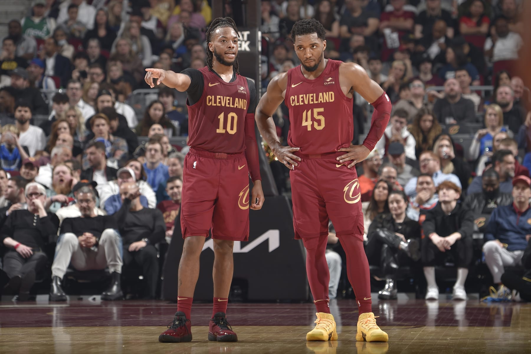 CLEVELAND, OH - FEBRUARY 27: Darius Garland #10 and Donovan Mitchell #45 of the Cleveland Cavaliers talk during the game against the Dallas Mavericks on February 27, 2024 at Rocket Mortgage FieldHouse in Cleveland, Ohio. NOTE TO USER: User expressly acknowledges and agrees that, by downloading and/or using this Photograph, user is consenting to the terms and conditions of the Getty Images License Agreement. Mandatory Copyright Notice: Copyright 2024 NBAE (Photo by David Liam Kyle/NBAE via Getty Images)