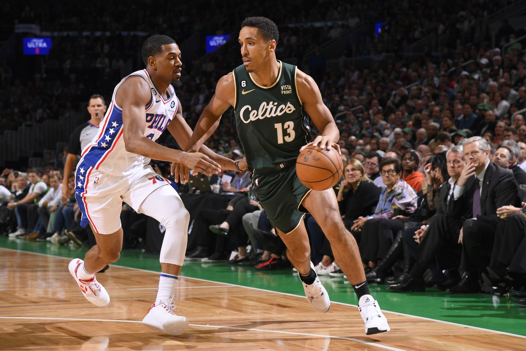 BOSTON, MA - OCTOBER 18: Malcolm Brogdon #13 of the Boston Celtics drives to the basket during the game against the Philadelphia 76ers on October 18, 2022 at the TD Garden in Boston, Massachusetts.  NOTE TO USER: User expressly acknowledges and agrees that, by downloading and or using this photograph, User is consenting to the terms and conditions of the Getty Images License Agreement. Mandatory Copyright Notice: Copyright 2022 NBAE  (Photo by Brian Babineau/NBAE via Getty Images)
