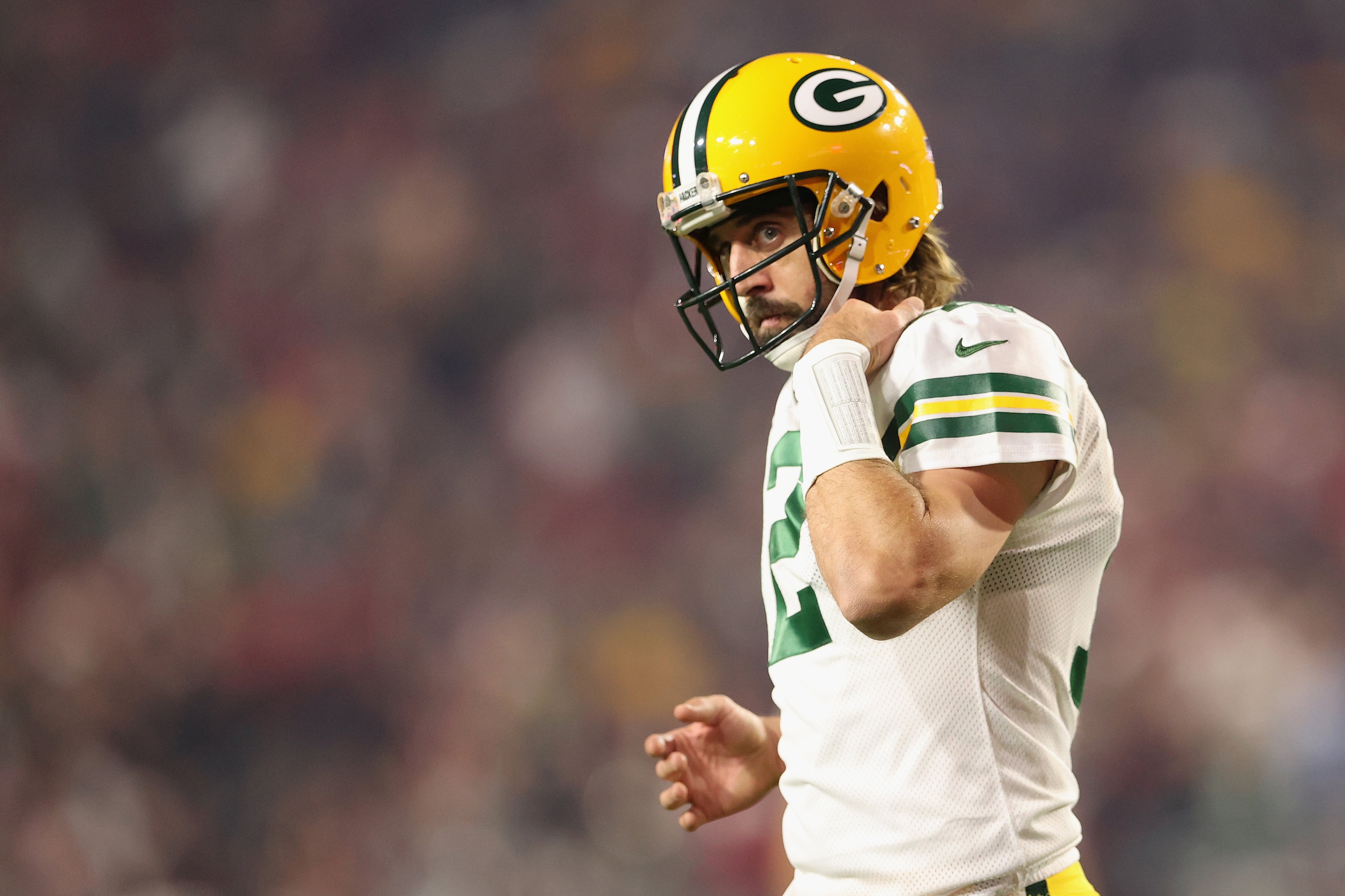 GLENDALE, ARIZONA - OCTOBER 28: Quarterback Aaron Rodgers #12 of the Green Bay Packers walks off the field during the second half of the NFL game at State Farm Stadium on October 28, 2021 in Glendale, Arizona. The Packers defeated the Cardinals 24-21.  (Photo by Christian Petersen/Getty Images)