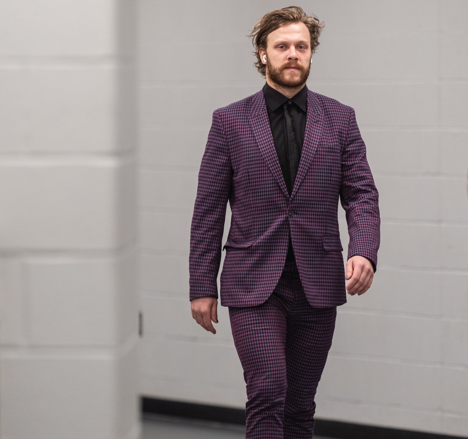 ELMONT, NEW YORK - DECEMBER 15: David Pastrnak #88 of the Boston Bruins arrives to the arena prior to the game against the New York Islanders at UBS Arena on December 15, 2023 in Elmont, New York. (Photo by Michael Mooney/NHLI via Getty Images)