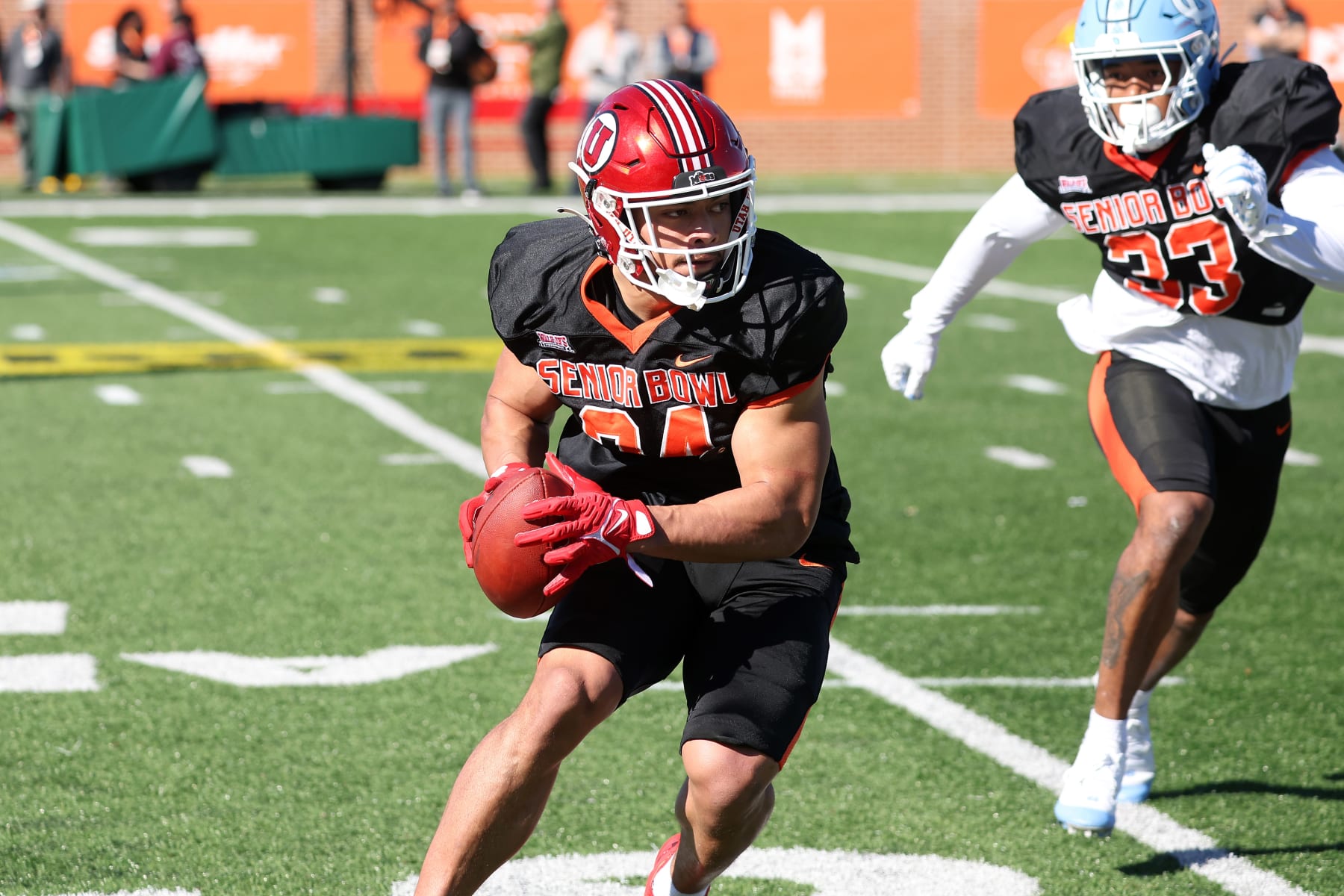 MOBILE, AL - JANUARY 31: National defensive back Sione Vaki of Utah (34) during the National team practice for the Reese's Senior Bowl on January 31, 2024 at Hancock Whitney Stadium in Mobile, Alabama.  (Photo by Michael Wade/Icon Sportswire via Getty Images)