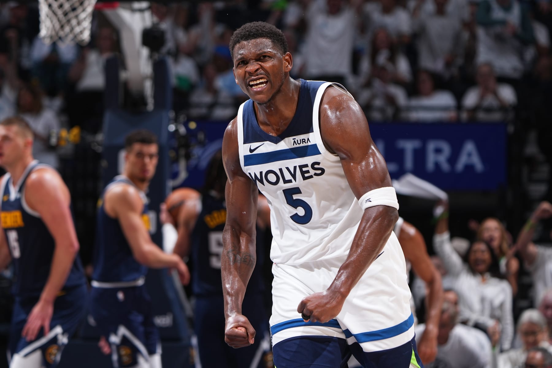 MINNEAPOLIS, MN - MAY 12: Anthony Edwards #5 of the Minnesota Timberwolves celebrates during the game against the Denver Nuggets during Round 2 Game 4 of the 2024 NBA Playoffs on May 12, 2024 at Target Center in Minneapolis, Minnesota. NOTE TO USER: User expressly acknowledges and agrees that, by downloading and/or using this Photograph, user is consenting to the terms and conditions of the Getty Images License Agreement. Mandatory Copyright Notice: Copyright 2024 NBAE (Photo by Garrett Ellwood/NBAE via Getty Images)