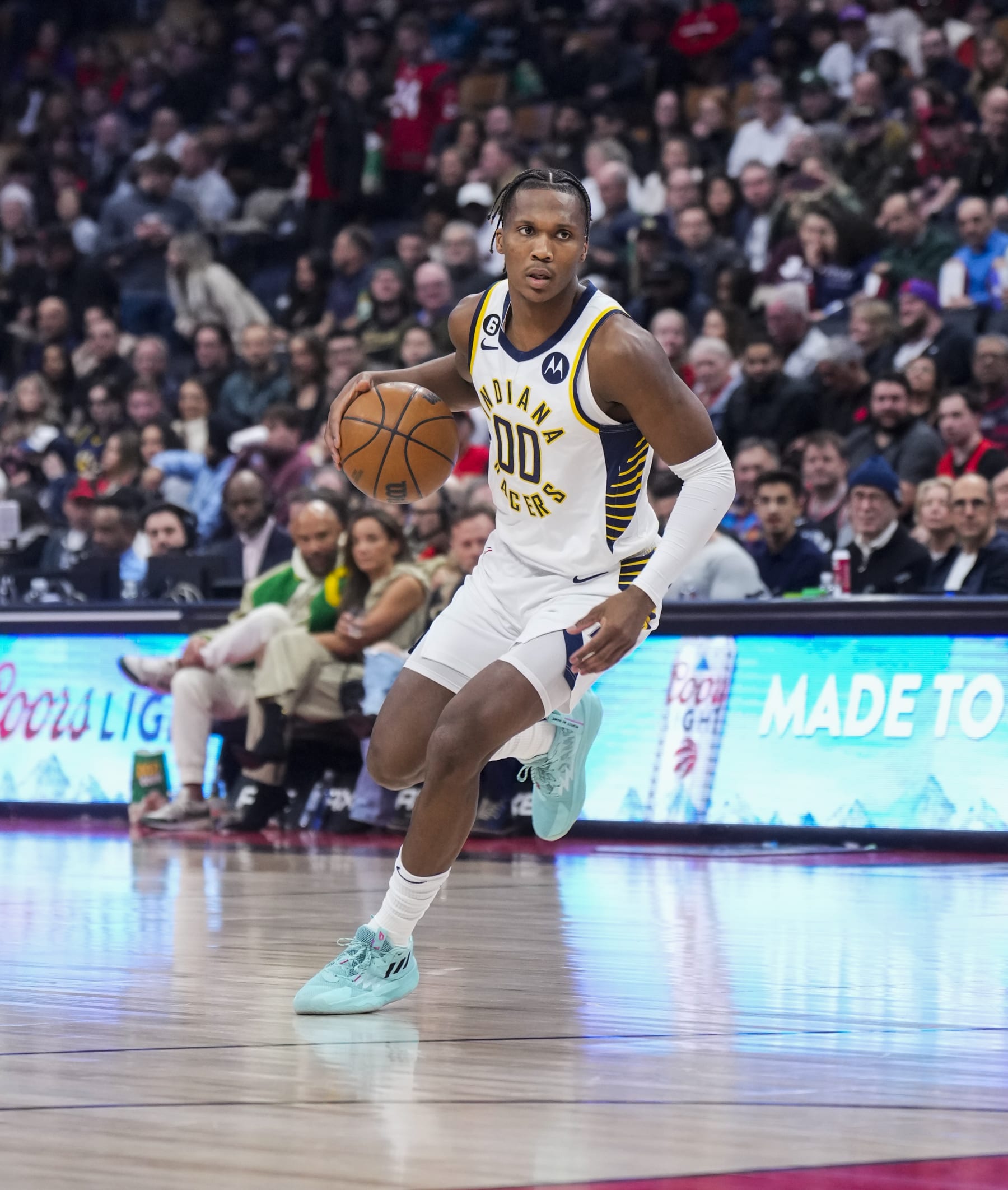 TORONTO, ON - MARCH 22: Bennedict Mathurin #0 of the Indiana Pacers dribbles against the Toronto Raptors during the first half of their basketball game at the Scotiabank Arena on March 22, 2023 in Toronto, Ontario, Canada. NOTE TO USER: User expressly acknowledges and agrees that, by downloading and/or using this Photograph, user is consenting to the terms and conditions of the Getty Images License Agreement. (Photo by Mark Blinch/Getty Images)