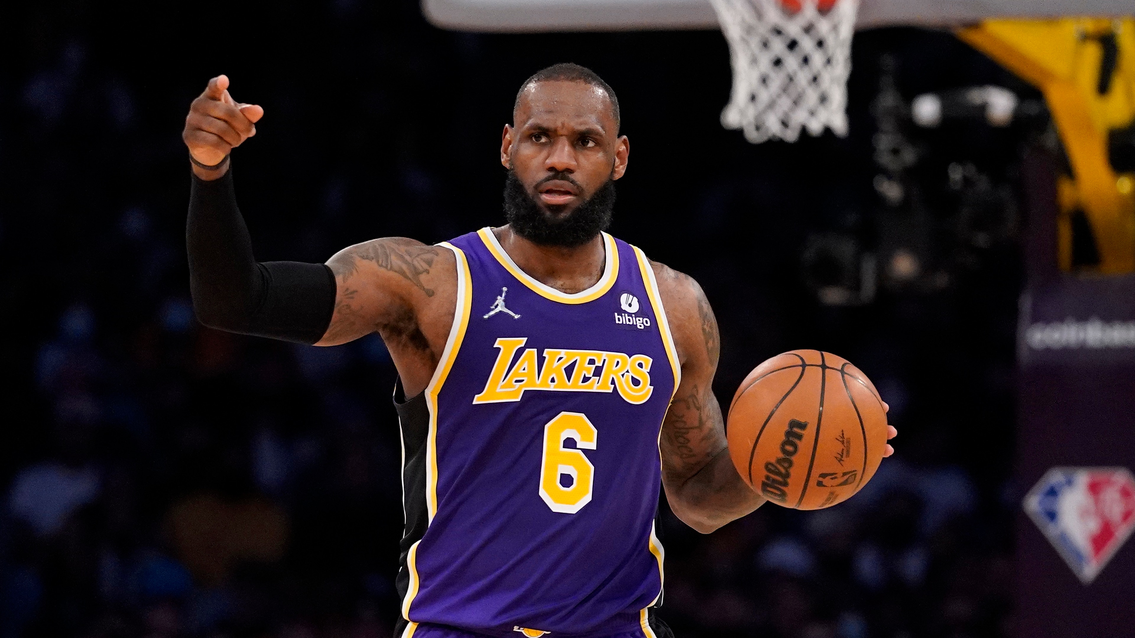 Los Angeles Lakers forward LeBron James gestures during the second half of an NBA basketball game against the Utah Jazz Wednesday, Feb. 16, 2022, in Los Angeles. The Lakers won 106-101. (AP Photo/Mark J. Terrill)