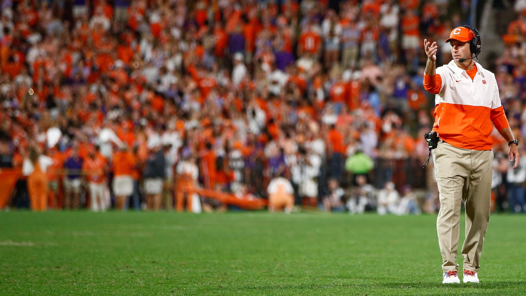 CLEMSON, SOUTH CAROLINA - NOVEMBER 18: Head coach Dabo Swinney of the Clemson Tigers signals to a player against the North Carolina Tar Heels at Memorial Stadium on November 18, 2023 in Clemson, South Carolina. (Photo by Isaiah Vazquez/Getty Images)