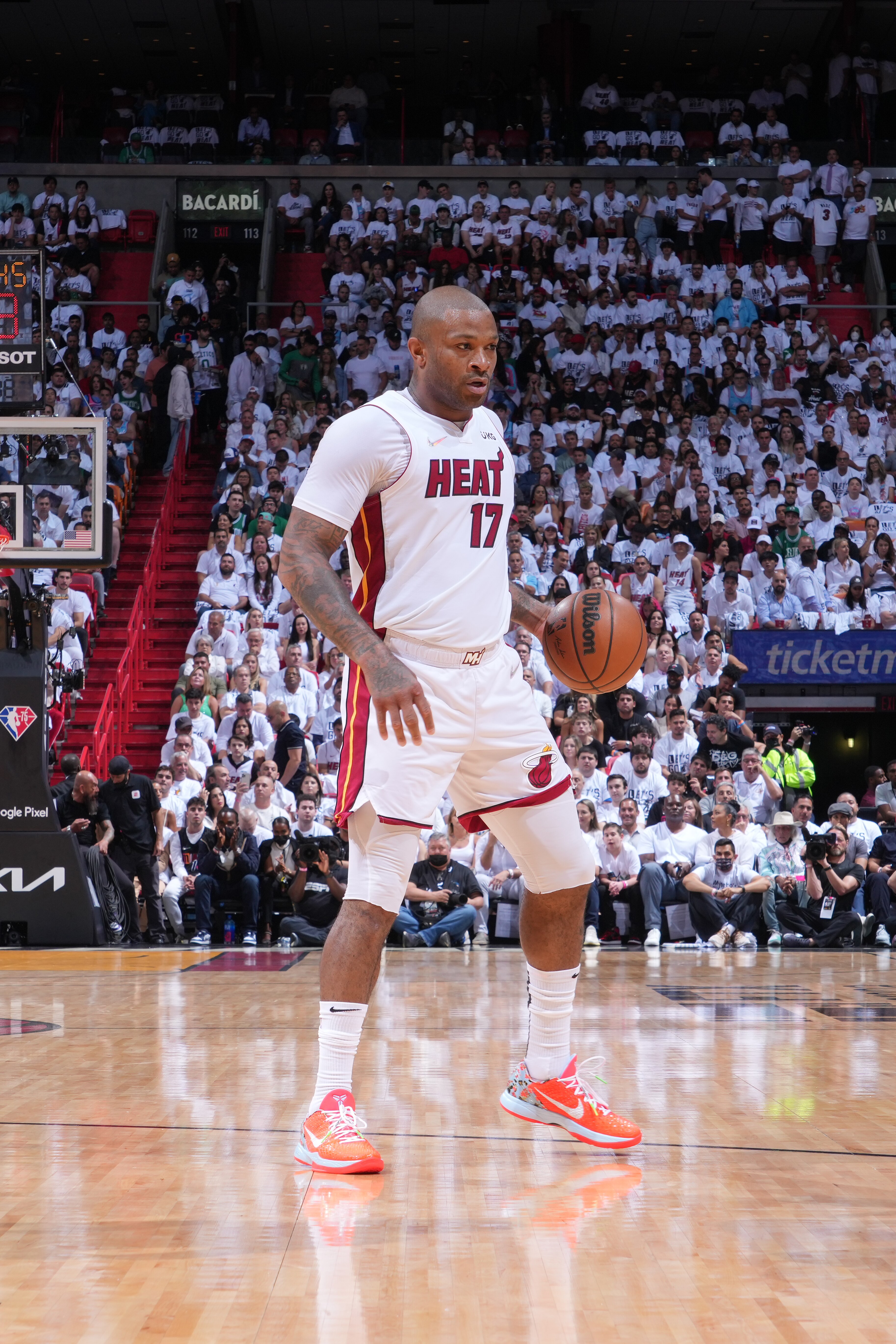 MIAMI, FL - MAY 25: P.J. Tucker #17 of the Miami Heat handles the ball against the Boston Celtics during Game 5 of the 2022 NBA Playoffs Eastern Conference Finals on May 25, 2022 at The FTX Arena in Miami, Florida. NOTE TO USER: User expressly acknowledges and agrees that, by downloading and/or using this Photograph, user is consenting to the terms and conditions of the Getty Images License Agreement. Mandatory Copyright Notice: Copyright 2022 NBAE (Photo by Jesse D. Garrabrant/NBAE via Getty Images)