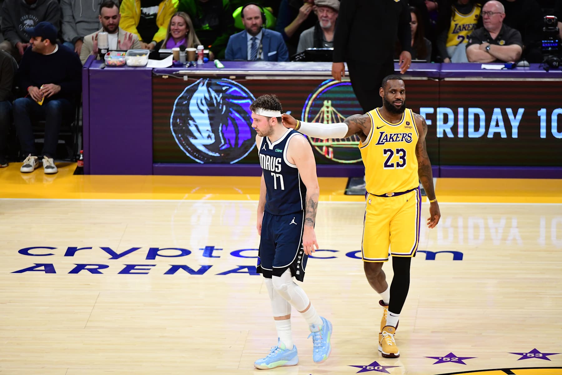 LOS ANGELES, CA - JANUARY 17: LeBron James #23 of the Los Angeles Lakers interacts with Luka Doncic #77 of the Dallas Mavericks during the game on January 17, 2024 at Crypto.Com Arena in Los Angeles, California. NOTE TO USER: User expressly acknowledges and agrees that, by downloading and/or using this Photograph, user is consenting to the terms and conditions of the Getty Images License Agreement. Mandatory Copyright Notice: Copyright 2024 NBAE (Photo by Adam Pantozzi/NBAE via Getty Images)