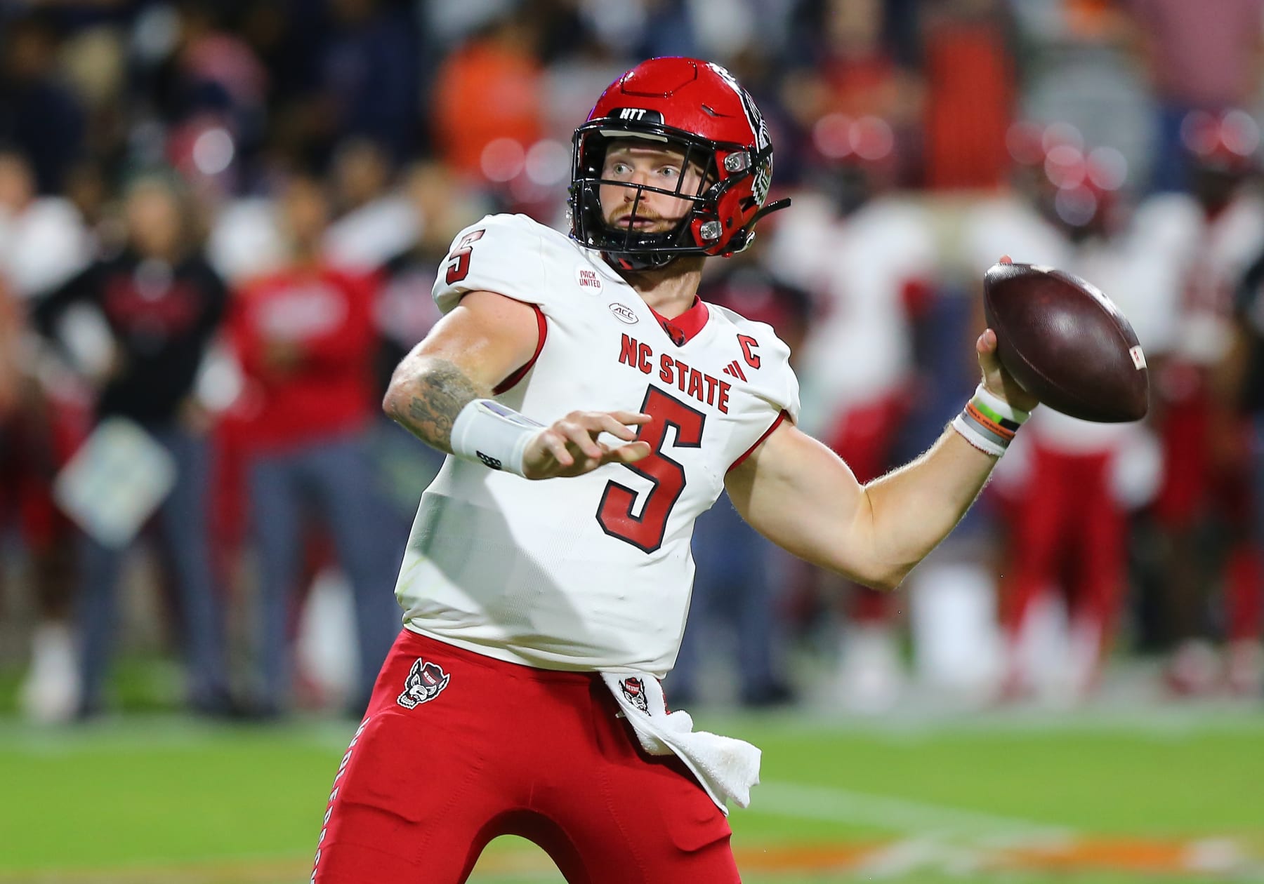CHARLOTTESVILLE, VA - SEPTEMBER 22: North Carolina State Wolfpack Quarterback Brennan Armstrong (5) throws a pass from the pocket during a college football game between the North Carolina State Wolfpack and the Virginia Cavaliers on September 22, 2023, at Scott Stadium in Charlottesville, VA. (Photo by Lee Coleman/Icon Sportswire via Getty Images)