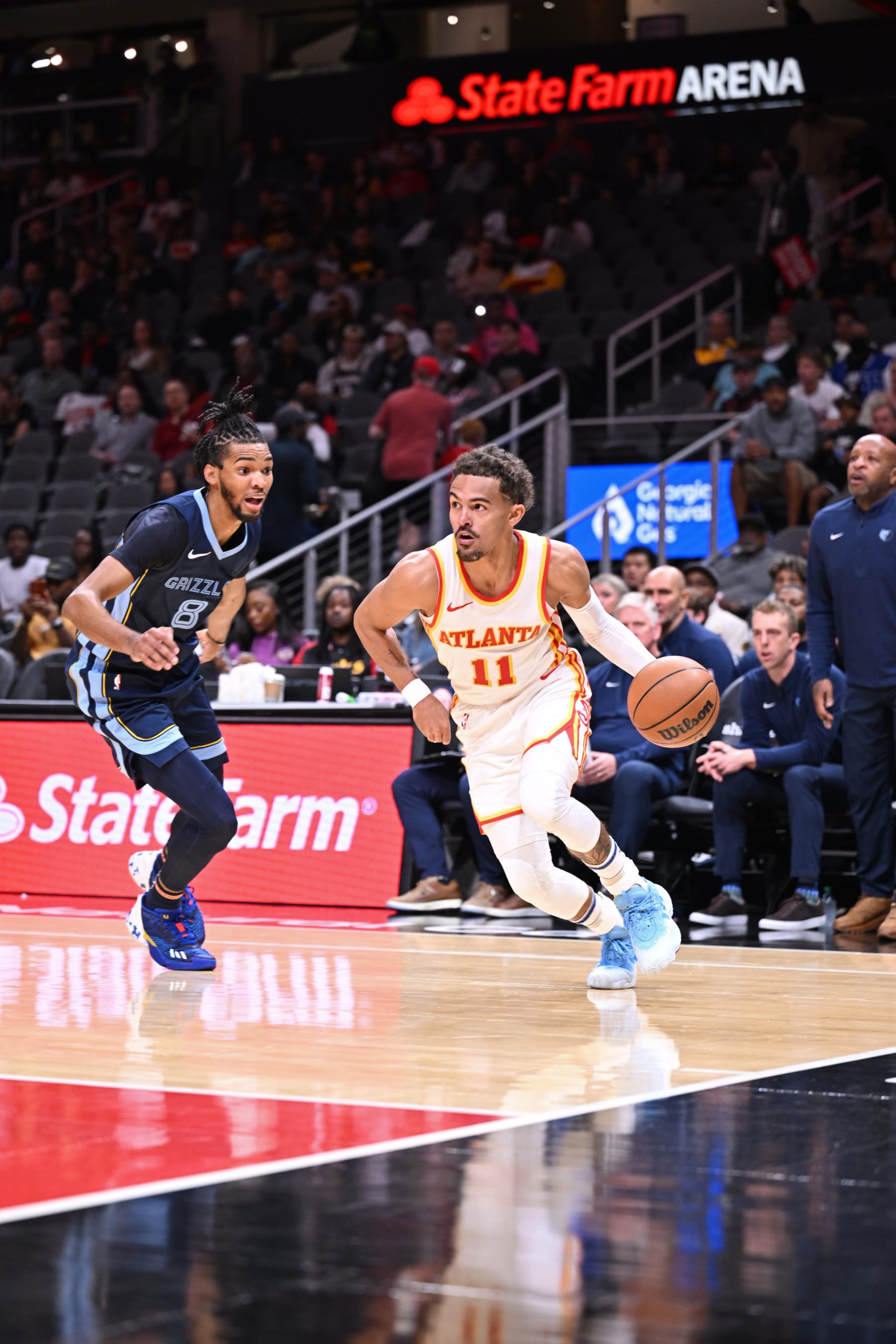 ATLANTA, GA - OCTOBER 12: Trae Young #11 of the Atlanta Hawks dribbles the ball during the game against the Memphis Grizzlies on October 12, 2023 at State Farm Arena in Atlanta, Georgia.  NOTE TO USER: User expressly acknowledges and agrees that, by downloading and/or using this Photograph, user is consenting to the terms and conditions of the Getty Images License Agreement. Mandatory Copyright Notice: Copyright 2023 NBAE (Photo by Adam Hagy/NBAE via Getty Images)