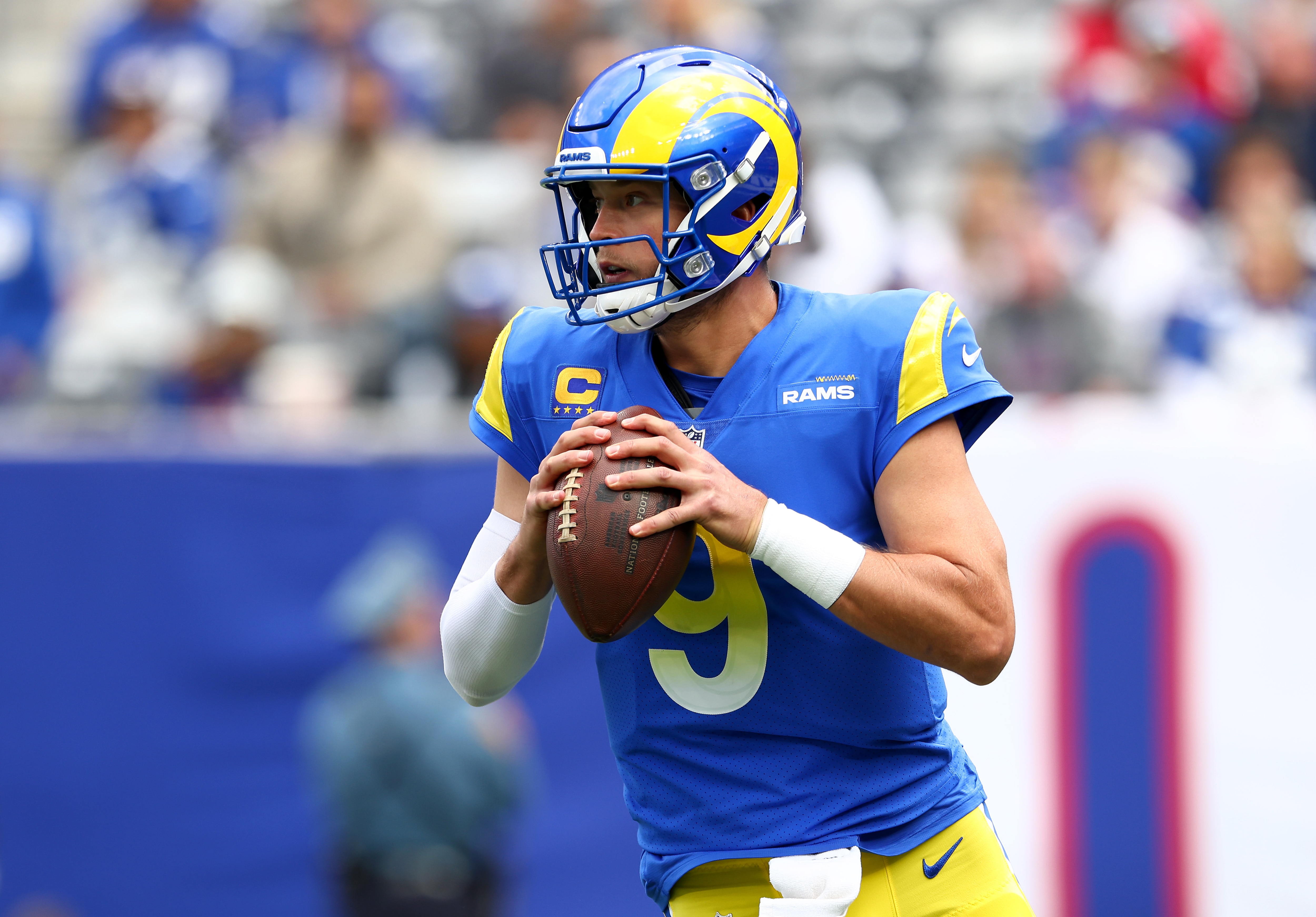 EAST RUTHERFORD, NEW JERSEY - OCTOBER 17: Matthew Stafford #9 of the Los Angeles Rams looks to pass against the New York Giants in the first quarter at MetLife Stadium on October 17, 2021 in East Rutherford, New Jersey. (Photo by Rich Schultz/Getty Images)