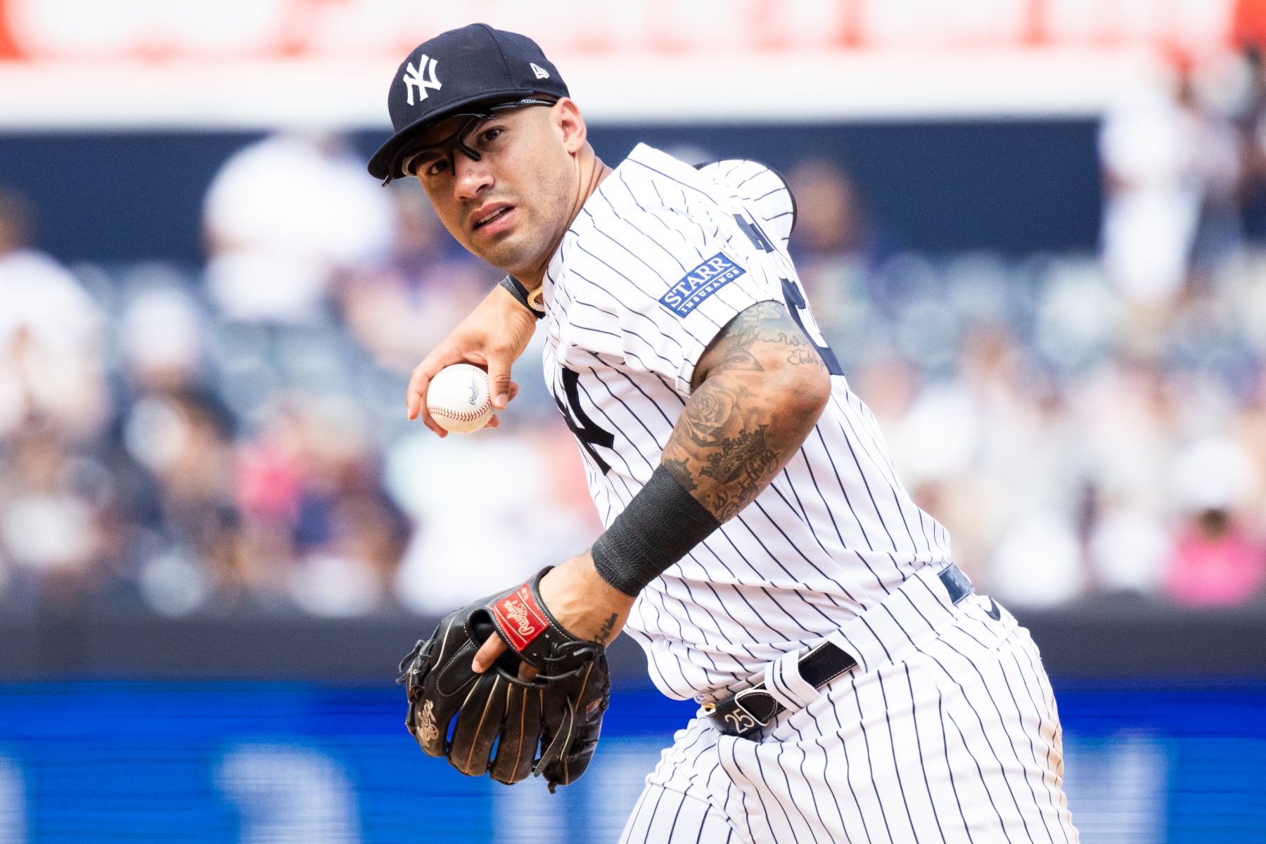 NEW YORK, NEW YORK - JULY 22: Gleyber Torres #25 of the New York Yankees throws to first base during the ninth inning of the game against the Kansas City Royals at Yankee Stadium on July 22, 2023 in the Bronx borough of New York City. (Photo by Dustin Satloff/Getty Images)