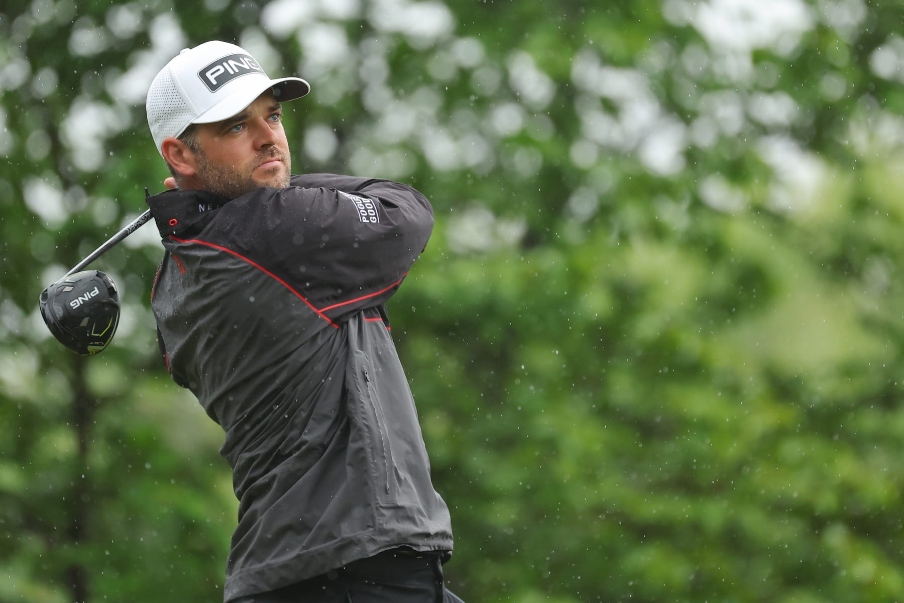 ROCHESTER, NEW YORK - MAY 20: Corey Conners of Canada plays his shot from the fourth tee during the third round of the 2023 PGA Championship at Oak Hill Country Club on May 20, 2023 in Rochester, New York. (Photo by Kevin C. Cox/Getty Images)