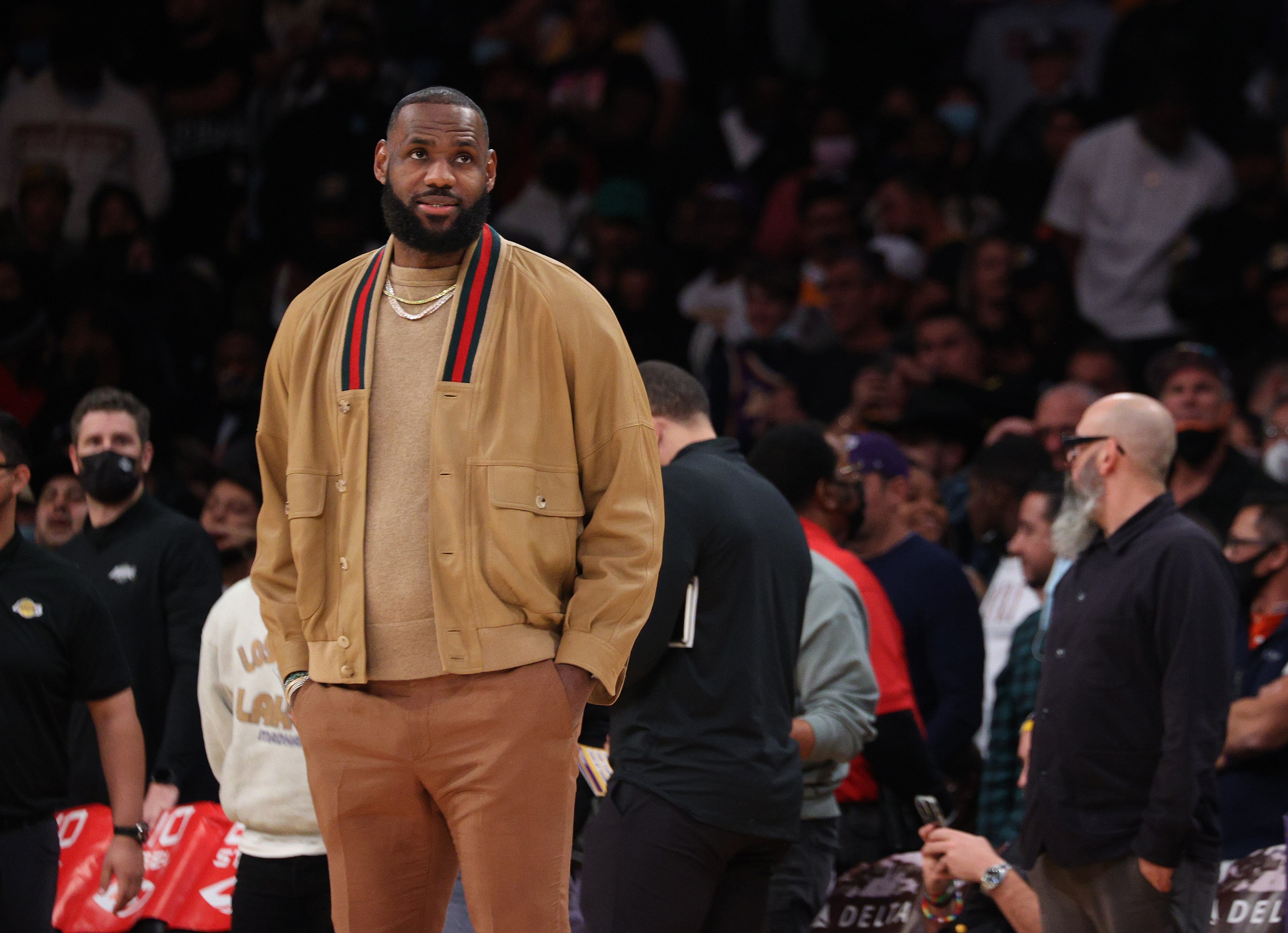 LOS ANGELES, CALIFORNIA - NOVEMBER 08: LeBron James #6 of the Los Angeles Lakers walks on court after a timeout during a 126-123 Lakers overtime win over the Charlotte Hornets at Staples Center on November 08, 2021 in Los Angeles, California. (Photo by Harry How/Getty Images)  NOTE TO USER: User expressly acknowledges and agrees that, by downloading and/or using this Photograph, user is consenting to the terms and conditions of the Getty Images License Agreement. Mandatory Copyright Notice: Copyright 2021 NBAE.