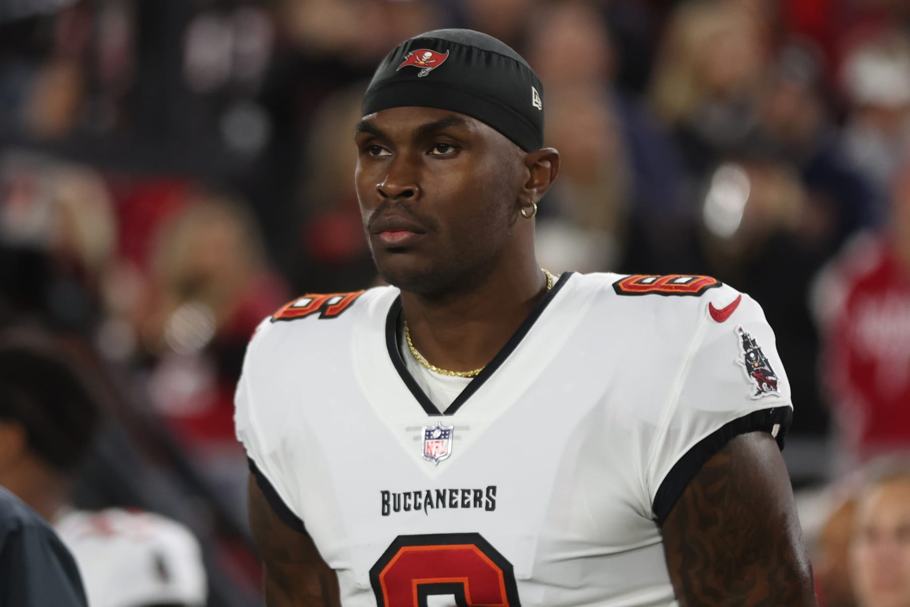 TAMPA, FLORIDA - JANUARY 16: Julio Jones #6 of the Tampa Bay Buccaneers stands on the sideline against the Dallas Cowboys prior to the NFC Wild Card Playoff game at Raymond James Stadium on January 16, 2023 in Tampa, Florida. (Perry Knotts/Getty Images)