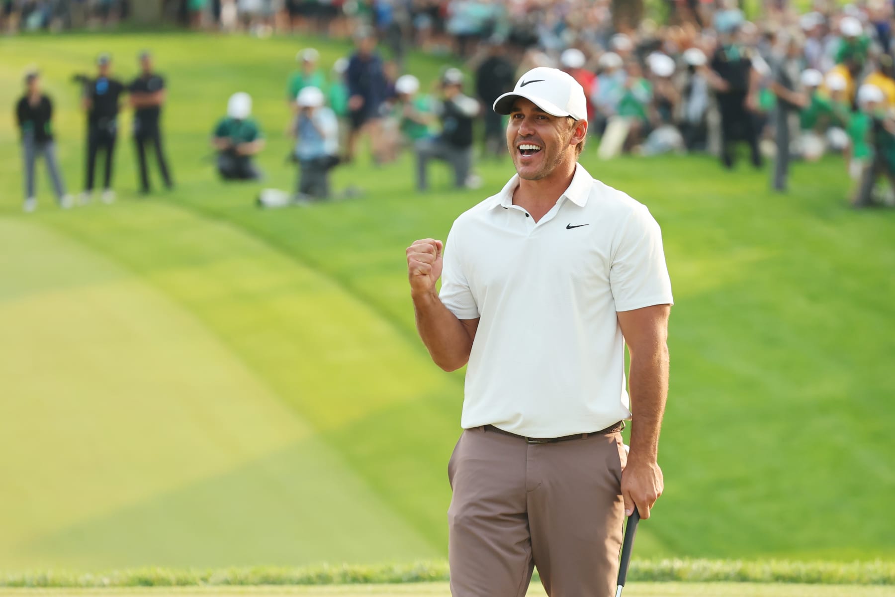 ROCHESTER, NEW YORK - MAY 21: Brooks Koepka of the United States celebrates winning on the 18th green during the final round of the 2023 PGA Championship at Oak Hill Country Club on May 21, 2023 in Rochester, New York. (Photo by Michael Reaves/Getty Images)