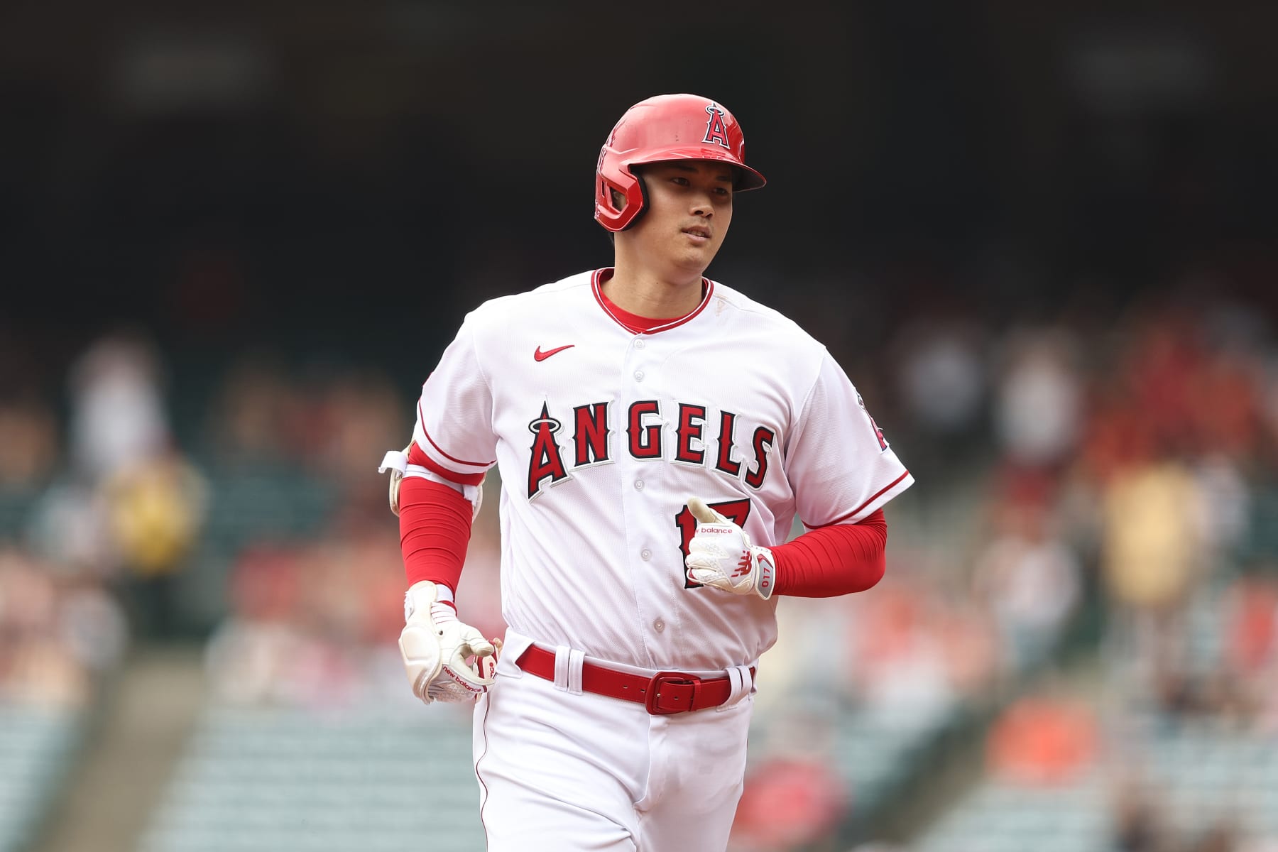 ANAHEIM, CALIFORNIA - JULY 23: Shohei Ohtani #17 of the Los Angeles Angels rounds the bases after hitting a solo home run against the Pittsburgh Pirates during the first inning at Angel Stadium of Anaheim on July 23, 2023 in Anaheim, California. (Photo by Michael Owens/Getty Images)