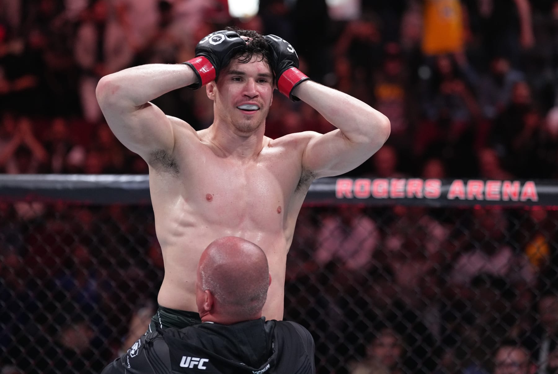 VANCOUVER, BRITISH COLUMBIA - JUNE 10:  Mike Malott celebrates his knockout victory over Adam Fugitt in their welterweight fight during the UFC 289 event at Rogers Arena on June 10, 2023 in Vancouver, Canada. (Photo by Jeff Bottari/Zuffa LLC)