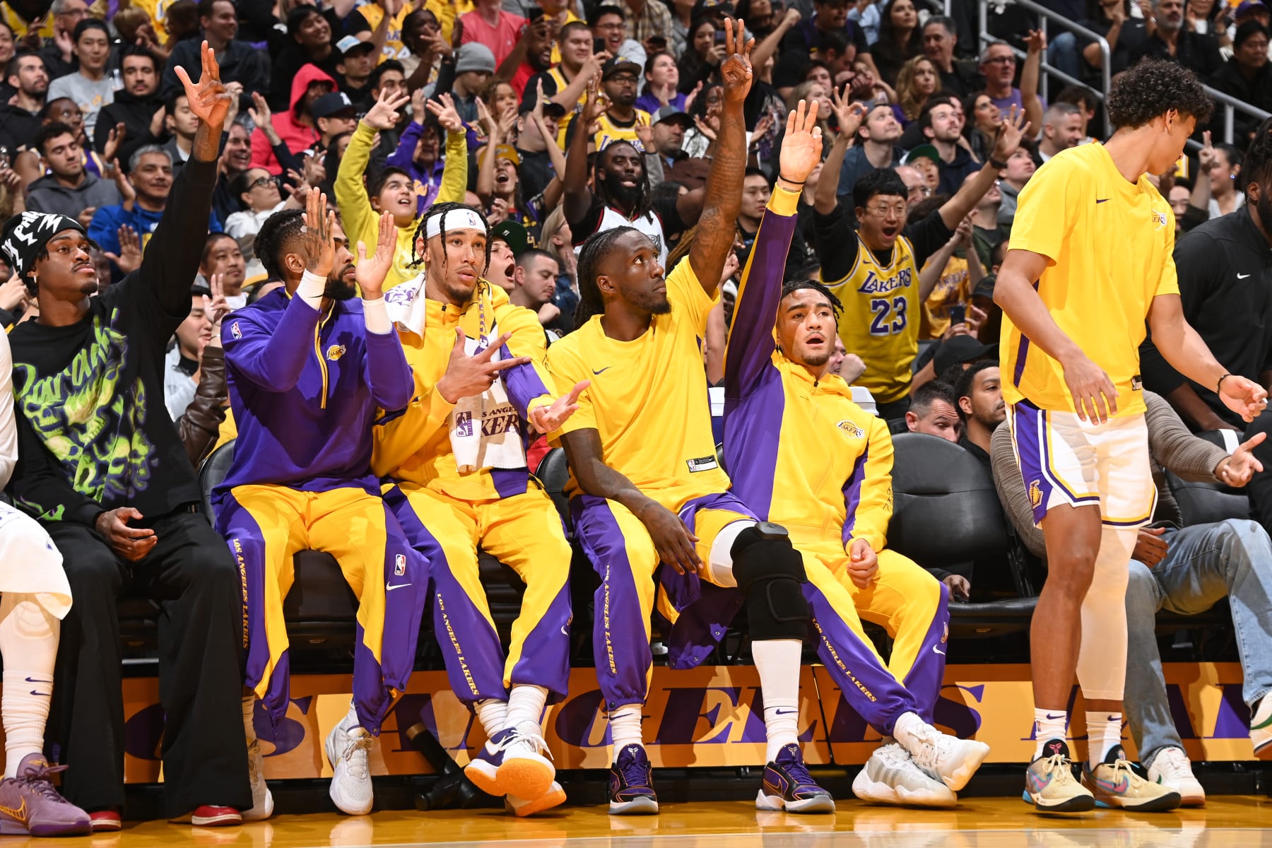 LOS ANGELES, CA - NOVEMBER 19:  A look at the Los Angeles Lakers team celebrating during the game on November 19, 2023 at Crypto.Com Arena in Los Angeles, California. NOTE TO USER: User expressly acknowledges and agrees that, by downloading and/or using this Photograph, user is consenting to the terms and conditions of the Getty Images License Agreement. Mandatory Copyright Notice: Copyright 2023 NBAE (Photo by Andrew D. Bernstein/NBAE via Getty Images)