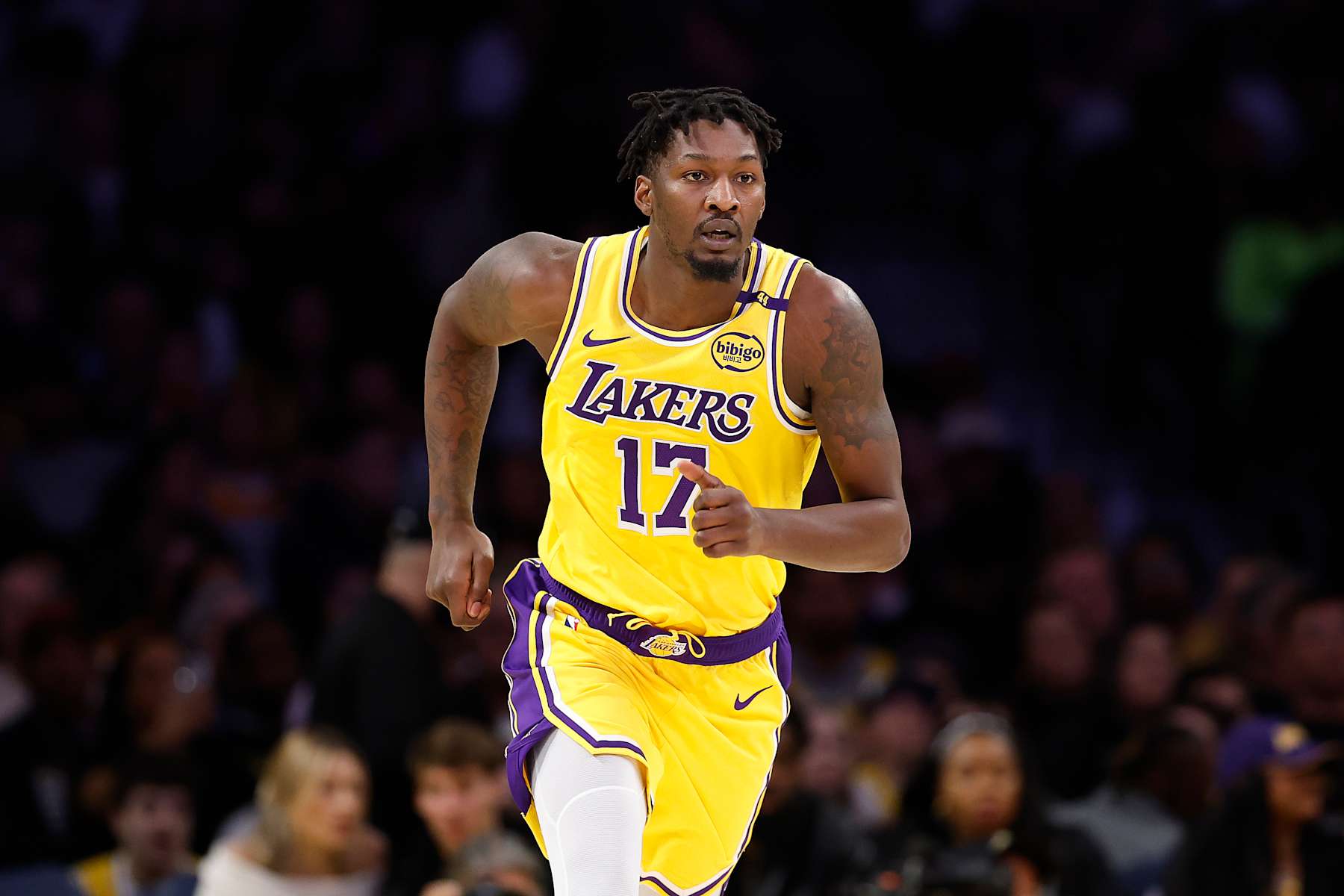 LOS ANGELES, CALIFORNIA - DECEMBER 31:  Dorian Finney-Smith #1 of the Los Angeles Lakers during the first half against the Cleveland Cavaliers at Crypto.com Arena on December 31, 2024 in Los Angeles, California.  NOTE TO USER: User expressly acknowledges and agrees that, by downloading and or using this photograph, User is consenting to the terms and conditions of the Getty Images License Agreement.  (Photo by Ronald Martinez/Getty Images)