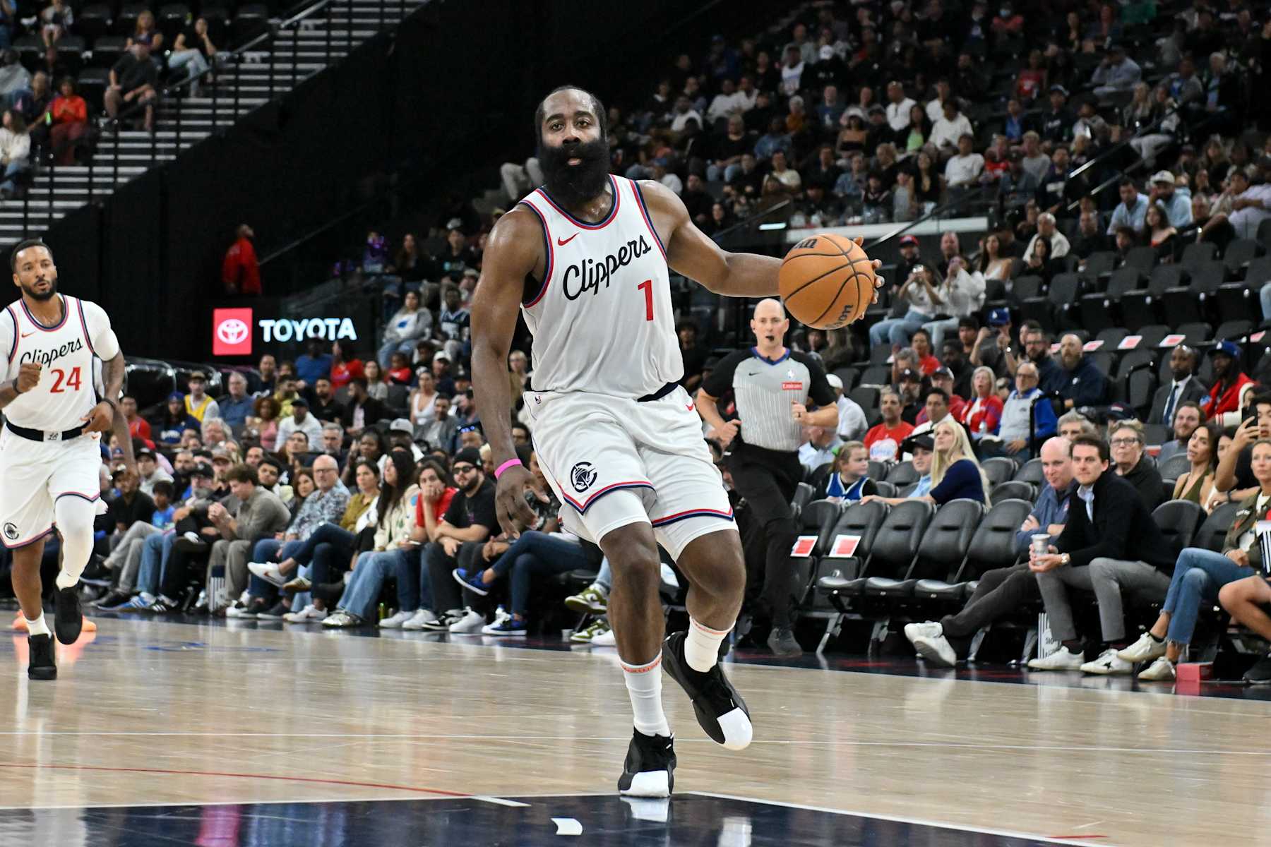 INGLEWOOD, CALIFORNIA - OCTOBER 14: James Harden #1 of the LA Clippers dribbles the ball during the first half of the game against the \DAL at Intuit Dome on October 14, 2024 in Inglewood, California. NOTE TO USER: User expressly acknowledges and agrees that, by downloading and or using this photograph, User is consenting to the terms and conditions of the Getty Images License Agreement. (Photo by Allen Berezovsky/Getty Images)