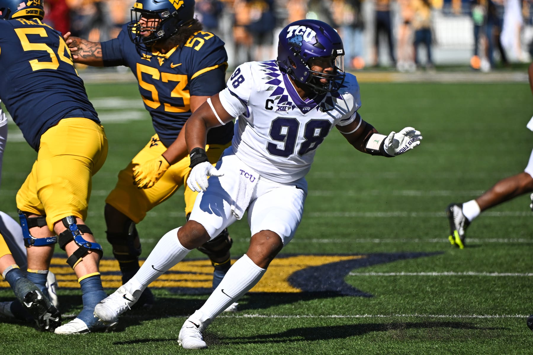 MORGANTOWN, WV - OCTOBER 29, 2022: Dylan Horton #98 of the TCU Horn Frogs rushes the line of scrimmage during the first half against the West Virginia Mountaineers at Milan Puskar Stadium on October 29, 2022 in Morgantown, West Virginia. (Photo by Chris Bernacchi/Diamond Images via Getty Images)