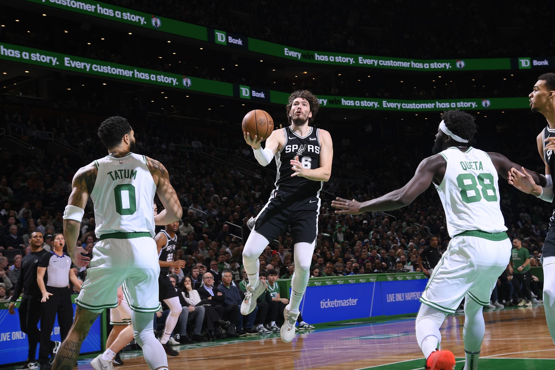 BOSTON, MA - JANUARY 17: Cedi Osman #16 of the San Antonio Spurs drives to the basket during the game against the Boston Celtics on January 17, 2024 at the TD Garden in Boston, Massachusetts. NOTE TO USER: User expressly acknowledges and agrees that, by downloading and or using this photograph, User is consenting to the terms and conditions of the Getty Images License Agreement. Mandatory Copyright Notice: Copyright 2024 NBAE  (Photo by Brian Babineau/NBAE via Getty Images)