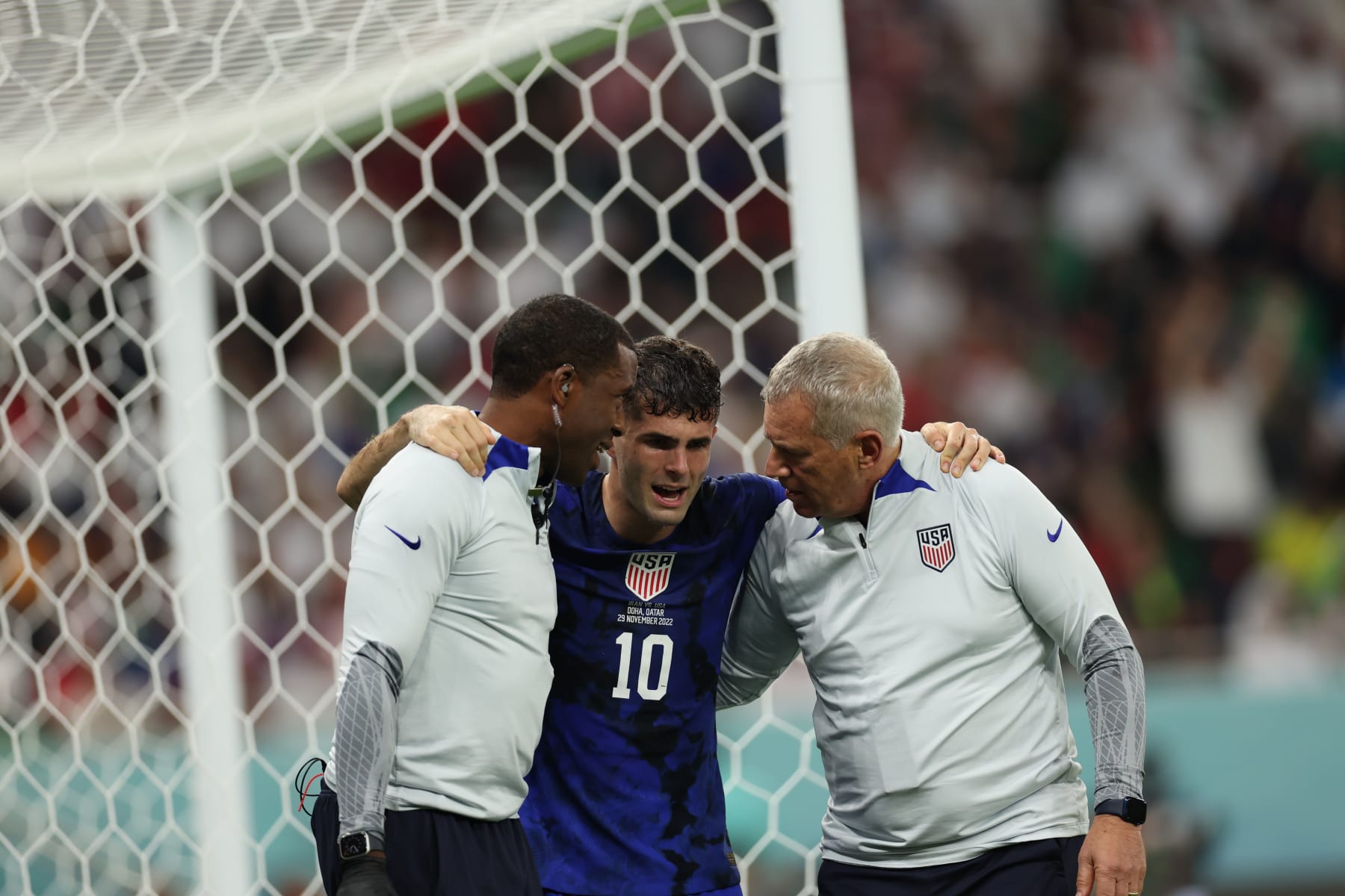 DOHA, QATAR - NOVEMBER 29: Christian Pulisic of USA is injured during the FIFA World Cup Qatar 2022 Group B match between IR Iran and USA at Al Thumama Stadium on November 29, 2022 in Doha, Qatar. (Photo by Amin Mohammad Jamali/Getty Images)