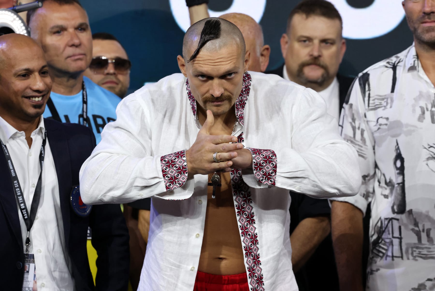 Ukraine's Oleksandr Usyk gestures during a public weighing ahead of the heavyweight boxing rematch for the WBA, WBO, IBO and IBF titles between Usyk and Britain's Anthony Joshua, in the Saudi Red Sea city of Jeddah, on August 19, 2022. - The match, billed as Rage on the Red Sea, is set to take place on August 20, 2022, at the Jeddah Super Dome. (Photo by Giuseppe CACACE / AFP) (Photo by GIUSEPPE CACACE/AFP via Getty Images)