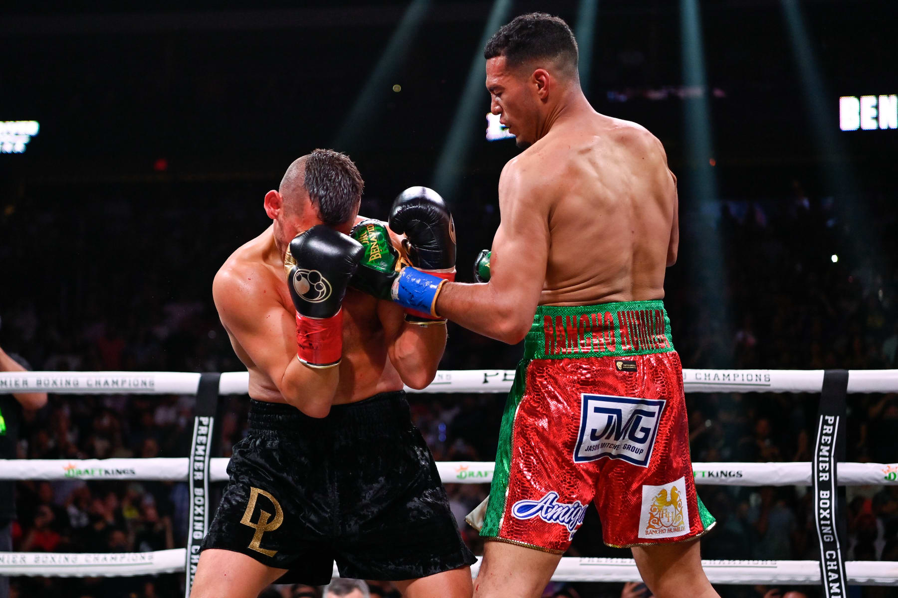 GLENDALE, ARIZONA - MAY 21: David Benavidez (R) throws a left  to David Lemieux (L) in the WBC Super Middleweight Interim Title fight during a Premier Boxing Champions card at Gila River Arena on May 21, 2022 in Glendale, Arizona. (Photo by Kelsey Grant/Getty Images)