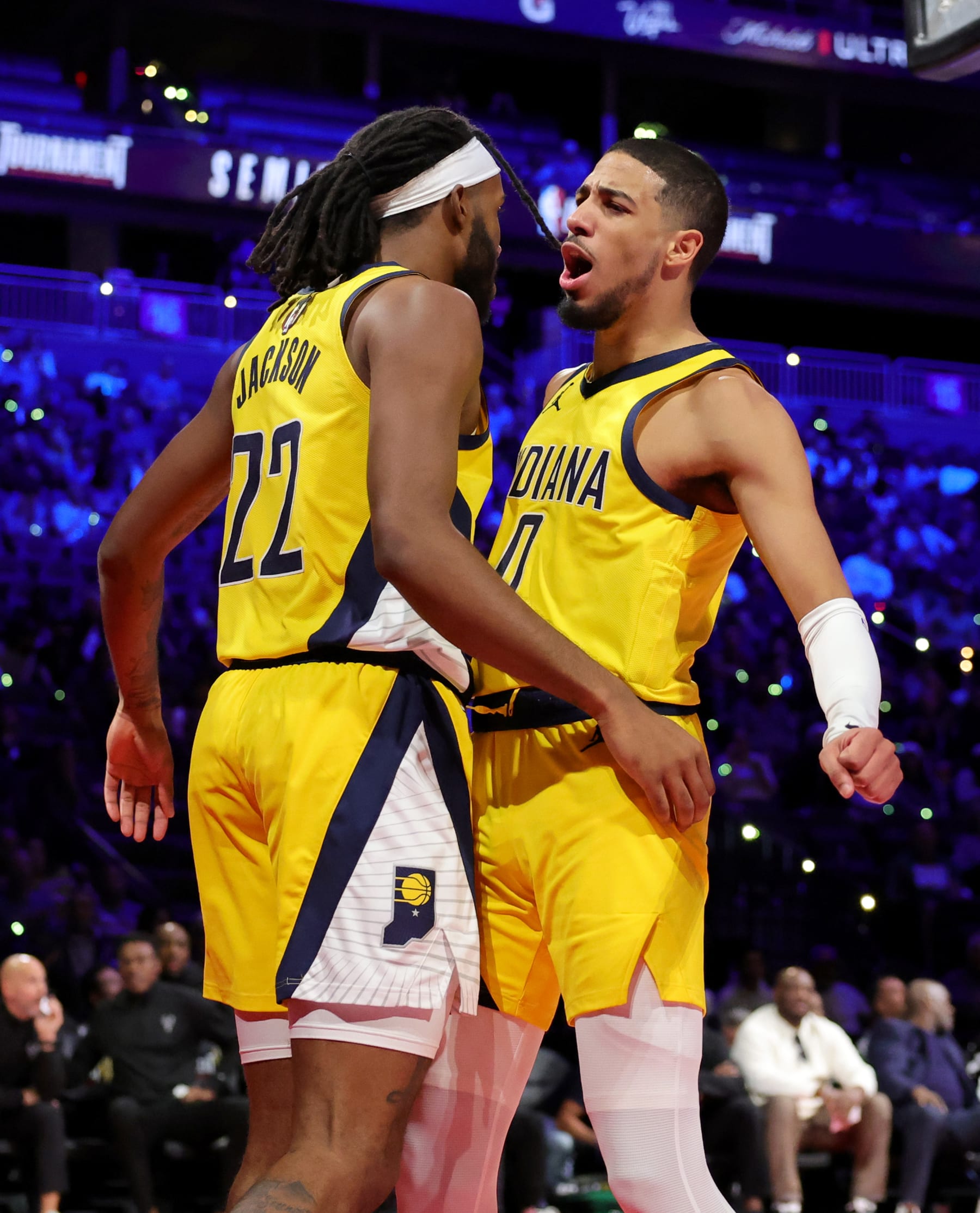 LAS VEGAS, NEVADA - DECEMBER 07: Isaiah Jackson #22 and Tyrese Haliburton #0 of the Indiana Pacers celebrate after Jackson scored and drew a foul against the Milwaukee Bucks in the first half of the East semifinal game of the inaugural NBA In-Season Tournament at T-Mobile Arena on December 07, 2023 in Las Vegas, Nevada. The Pacers defeated the Bucks 128-119. NOTE TO USER: User expressly acknowledges and agrees that, by downloading and or using this photograph, User is consenting to the terms and conditions of the Getty Images License Agreement. (Photo by Ethan Miller/Getty Images)