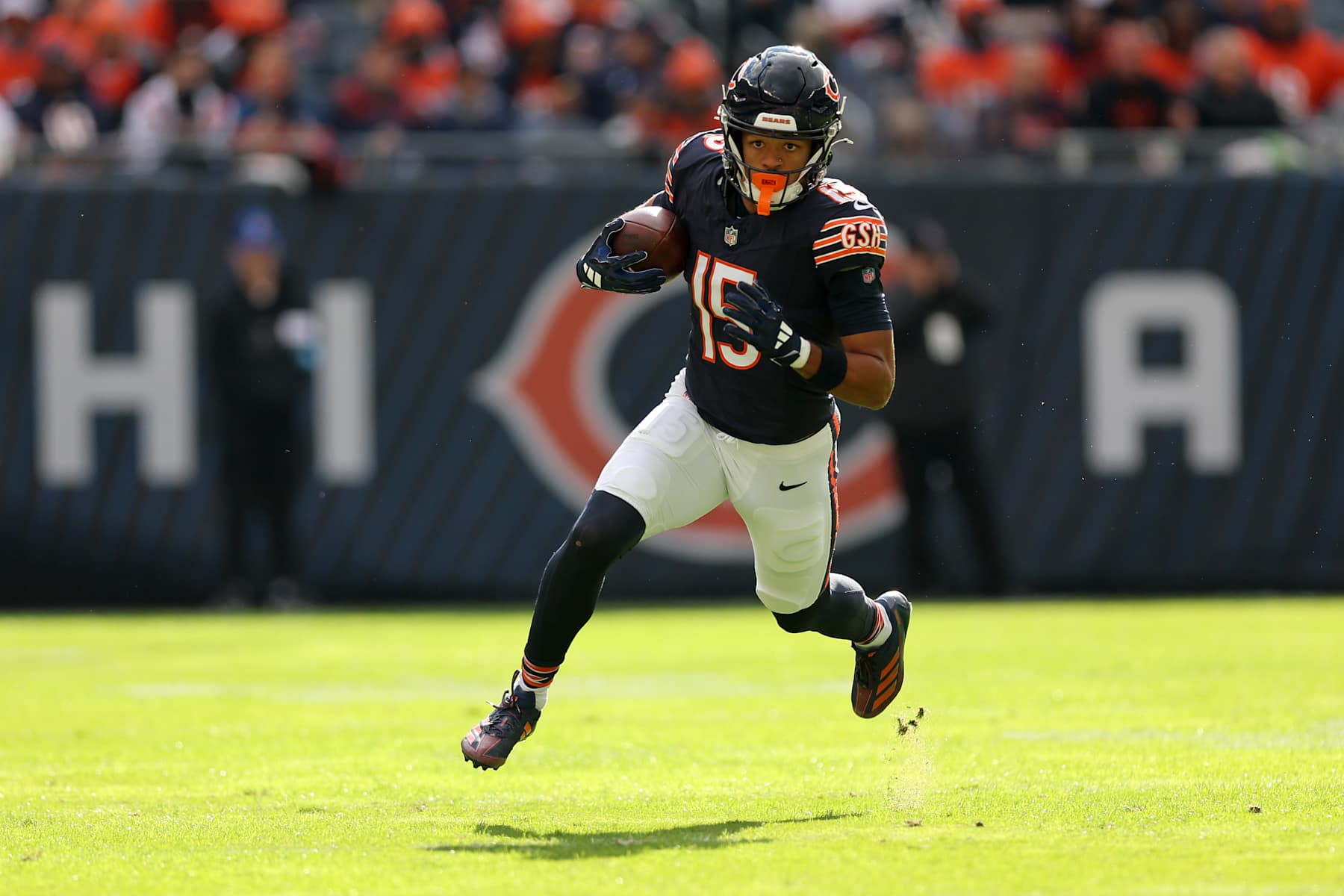 CHICAGO, ILLINOIS - NOVEMBER 10: Rome Odunze #15 of the Chicago Bears carries the ball against the New England Patriots during the first quarter at Soldier Field on November 10, 2024 in Chicago, Illinois. (Photo by Michael Reaves/Getty Images)
