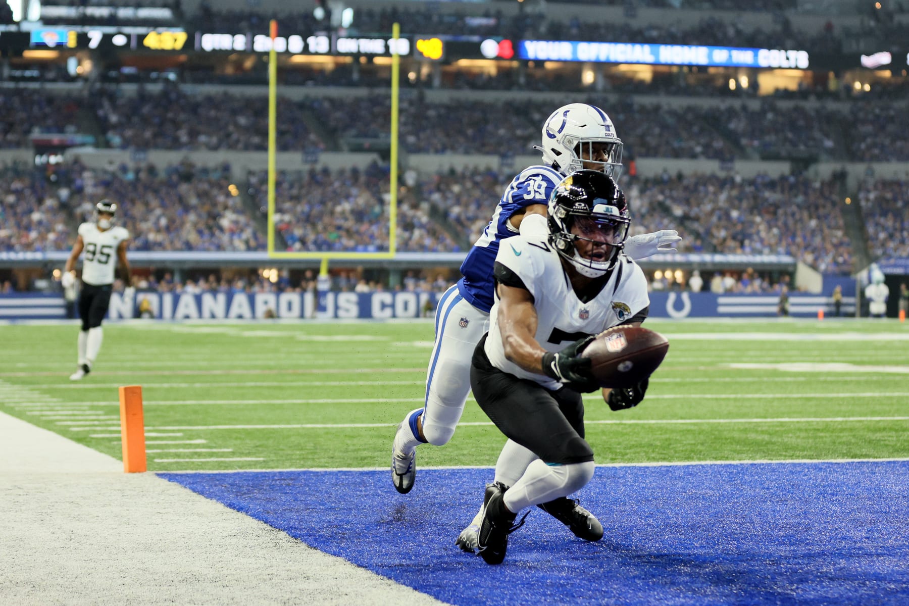 INDIANAPOLIS, INDIANA - SEPTEMBER 10: Zay Jones #7 of the Jacksonville Jaguars catches a touchdown against Darrell Baker Jr. #39 of the Indianapolis Colts in the first half of a game at Lucas Oil Stadium on September 10, 2023 in Indianapolis, Indiana. (Photo by Andy Lyons/Getty Images)