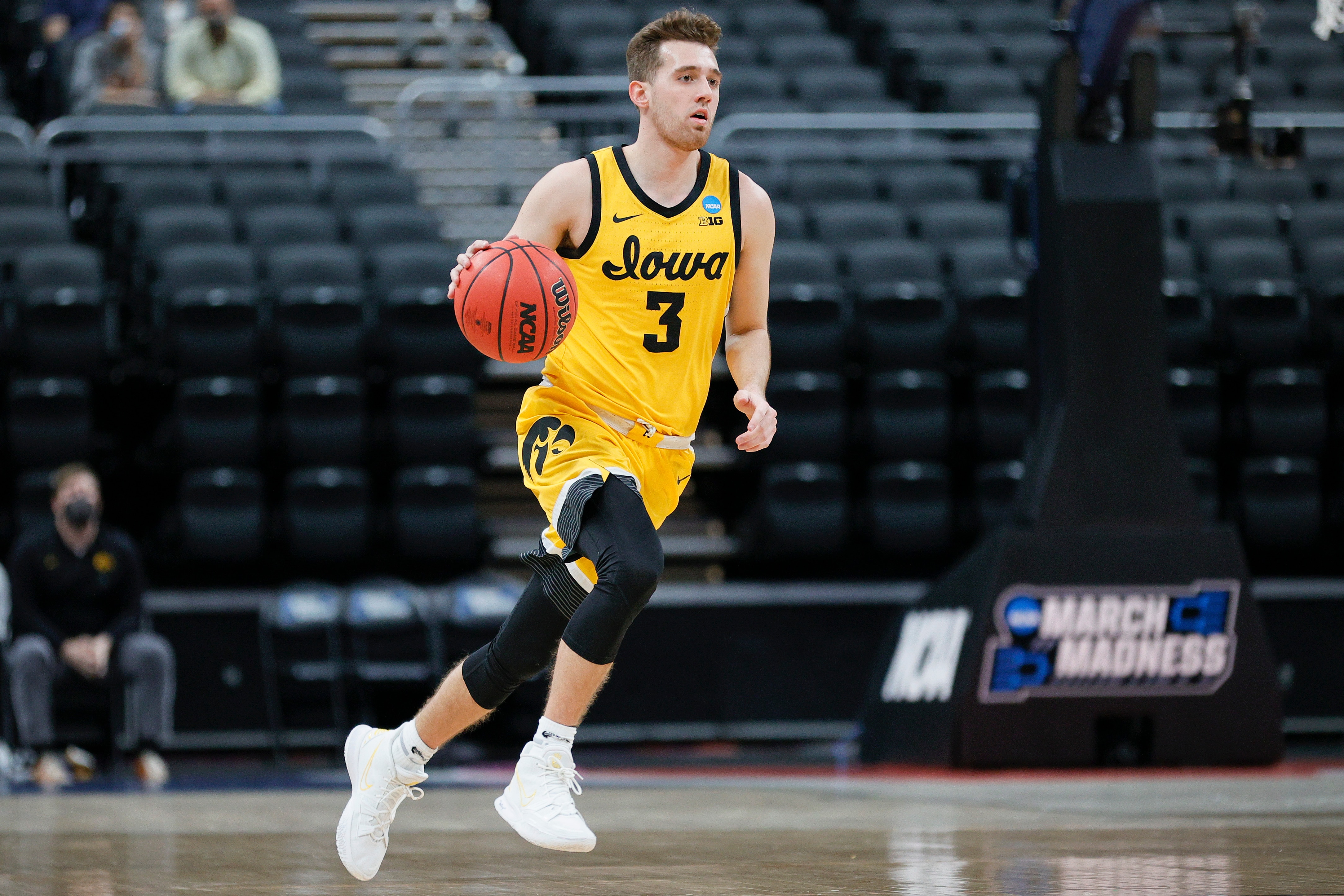 INDIANAPOLIS, INDIANA - MARCH 22: Jordan Bohannon #3 of the Iowa Hawkeyes handles the ball during the game against the Oregon Ducks in the second round of the 2021 NCAA Men's Basketball Tournament at Bankers Life Fieldhouse on March 22, 2021 in Indianapolis, Indiana. (Photo by Sarah Stier/Getty Images)
