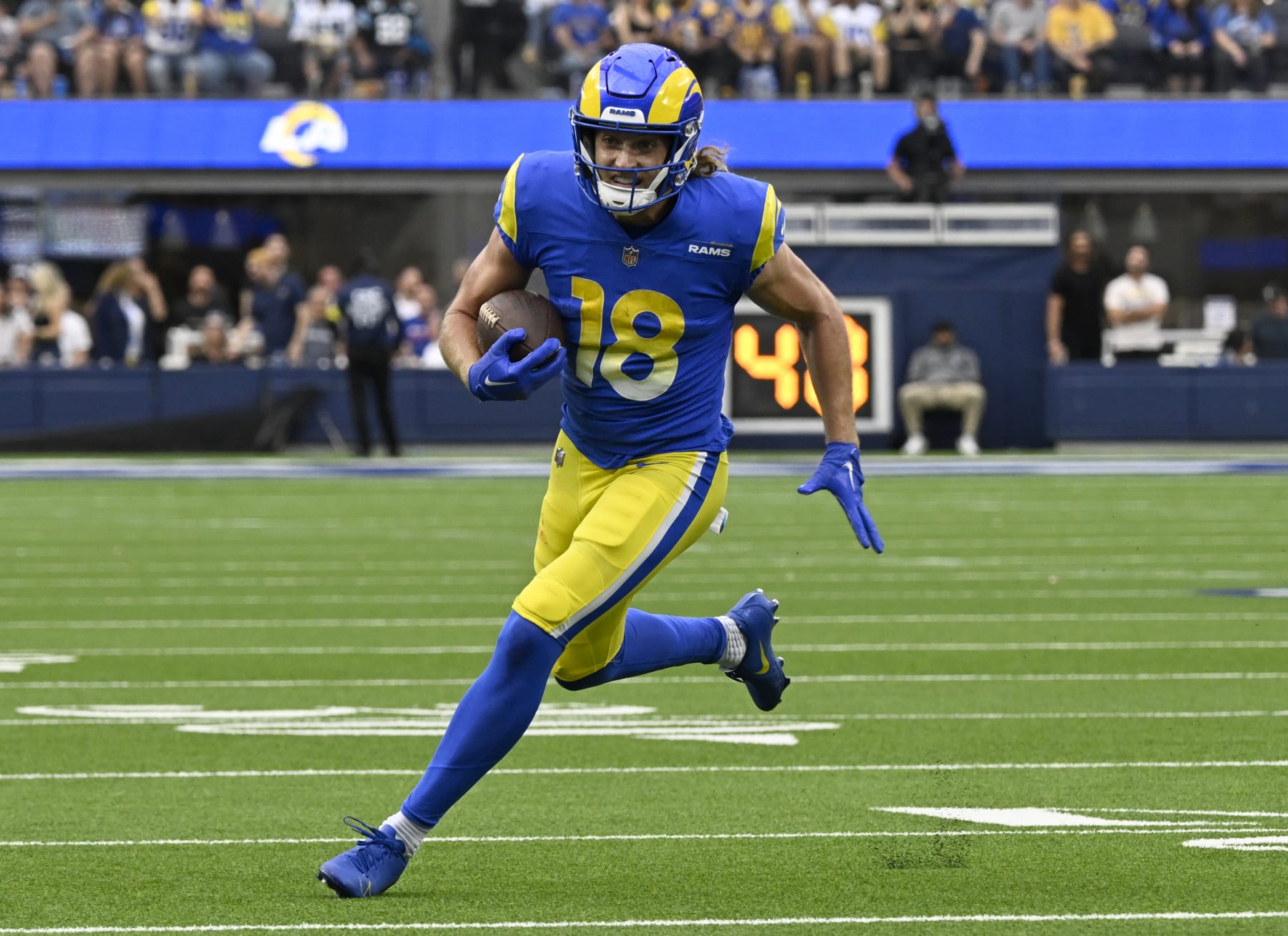 INGLEWOOD, CA - OCTOBER 16: Ben Skowronek #18 of the Los Angeles Rams runs for a touchdown against the Carolina Panthers at SoFi Stadium on October 16, 2022 in Inglewood, California. (Photo by John McCoy/Getty Images)