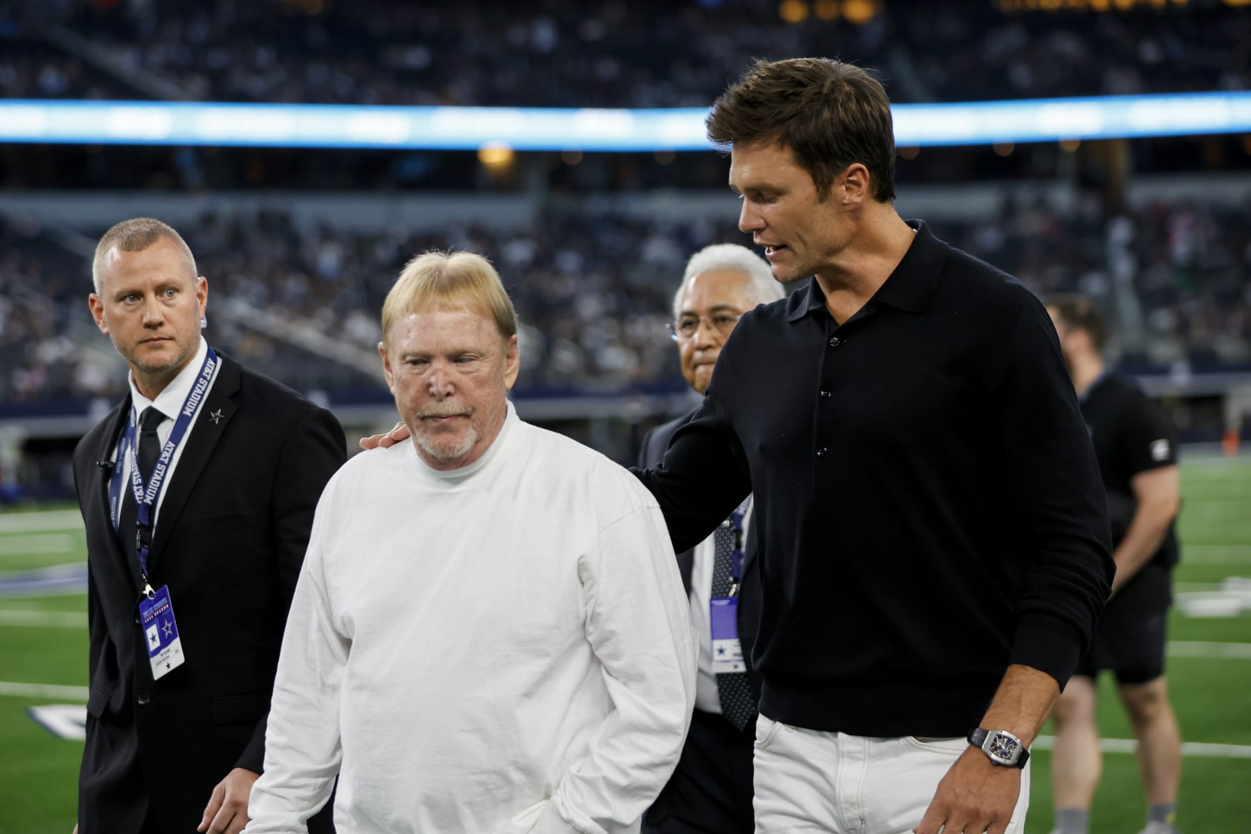 ARLINGTON, TX - AUGUST 26: Las Vegas Raiders owner Mark Davis walks off the field with former NFL quarterback Tom Brady before the preseason game between the Dallas Cowboys and the Las Vegas Raiders on August 26, 2023 at AT&T Stadium in Arlington, Texas. (Photo by Matthew Pearce/Icon Sportswire via Getty Images)