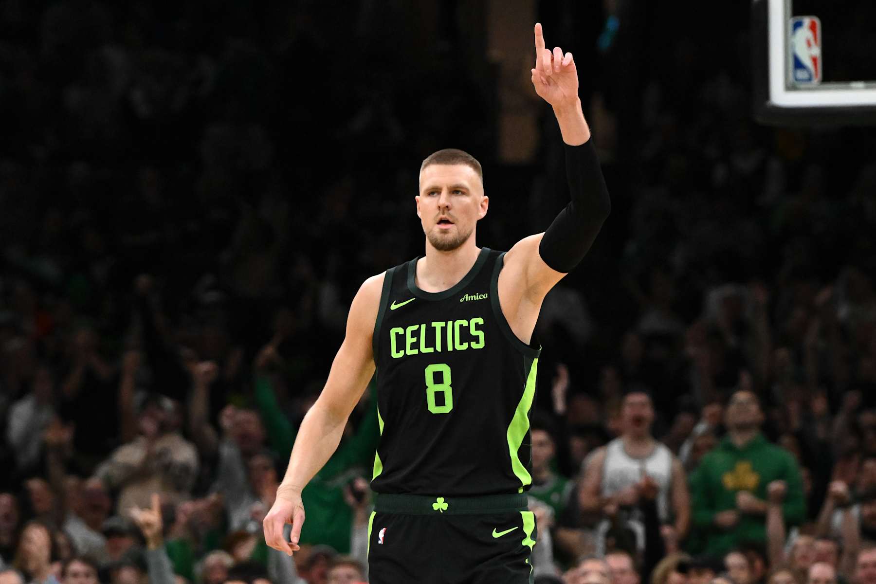 BOSTON, MASSACHUSETTS - NOVEMBER 25: Kristaps Porzingis #8 of the Boston Celtics reacts after making a three-point basket against the LA Clippers during the first quarter at the TD Garden on November 25, 2024 in Boston, Massachusetts. NOTE TO USER: User expressly acknowledges and agrees that, by downloading and or using this photograph, User is consenting to the terms and conditions of the Getty Images License Agreement. (Photo by Brian Fluharty/Getty Images)