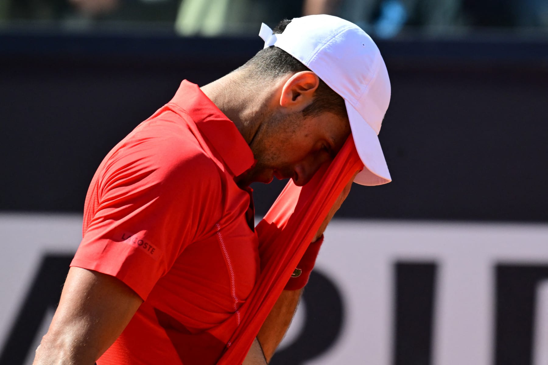 Serbia's Novak Djokovic gestures during his match against Chile's Alejandro Tabilo at the Men's ATP Rome Open tennis tournament at Foro Italico in Rome on May 12, 2024. (Photo by Tiziana FABI / AFP) (Photo by TIZIANA FABI/AFP via Getty Images)