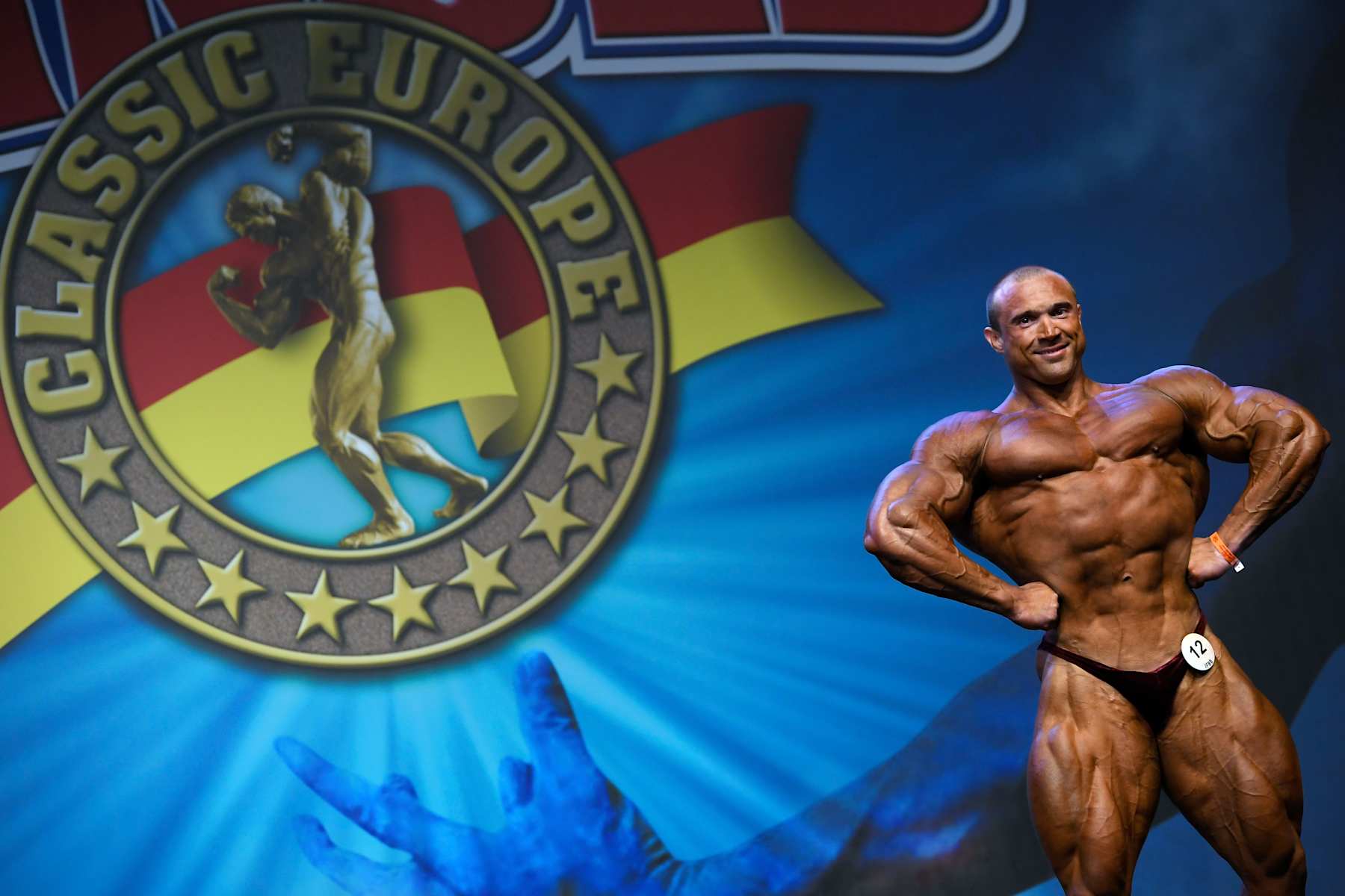 Belarusian bodybuilder Ilya Lukovets flexes his muscles for the judges during the Arnold Classic Europe 2019 bodybuilding competition in Barcelona on September 21, 2019. (Photo by LLUIS GENE / AFP)        (Photo credit should read LLUIS GENE/AFP via Getty Images)