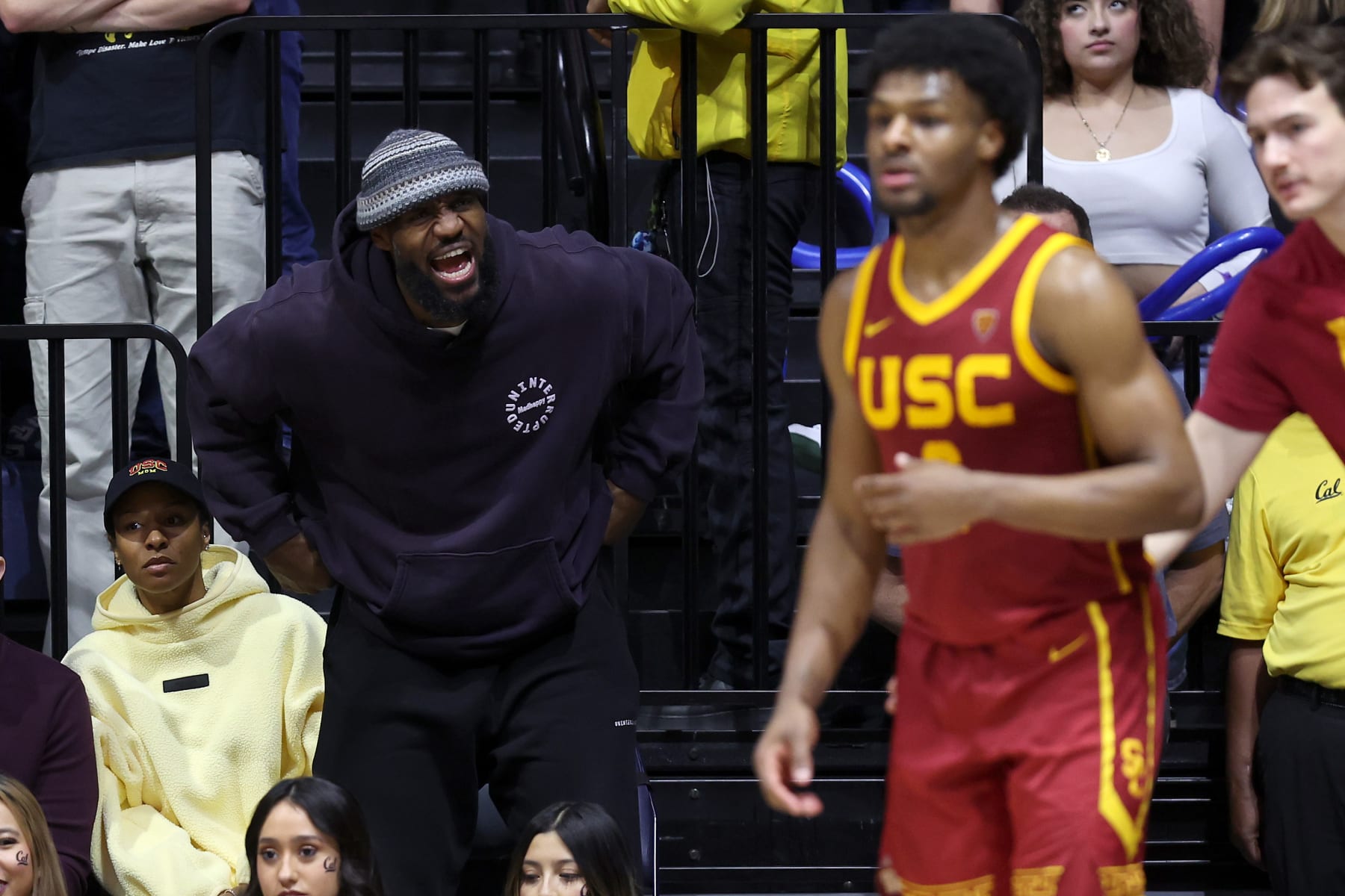 BERKELEY, CALIFORNIA - FEBRUARY 07: LeBron James #23 of the Los Angeles Lakers shouts to his son, Bronny James #6 of the USC Trojans, during Bronny's game against the California Golden Bears at Haas Pavilion on February 07, 2024 in Berkeley, California. (Photo by Ezra Shaw/Getty Images)