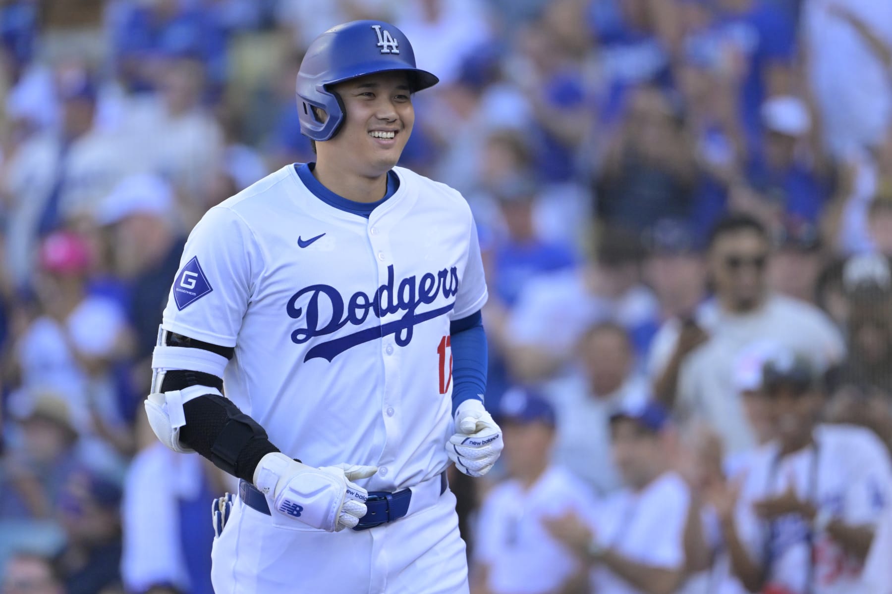 LOS ANGELES, CALIFORNIA - JULY 21: Shohei Ohtani #17 of the Los Angeles Dodgers celebrates as he heads to the dugout after hitting a 473 feet home run in the fifth inning against the Boston Red Sox at Dodger Stadium on July 21, 2024 in Los Angeles, California. (Photo by Jayne Kamin-Oncea/Getty Images)