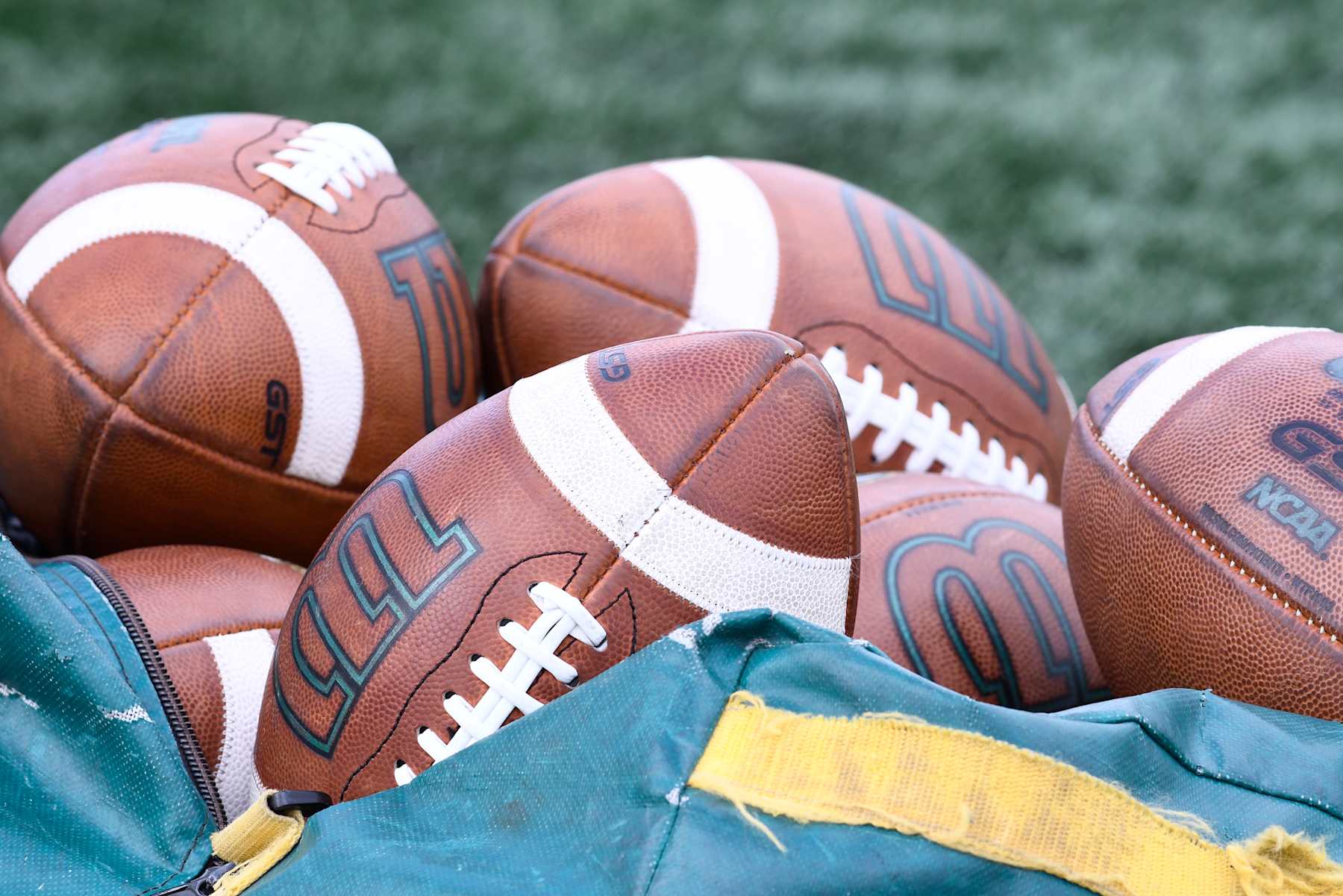 TERRE HAUTE, IN - OCTOBER 08: North Dakota State University Bison practice footballs sit in a bag before the game with the Indiana State University Sycamores, Saturday, October 8, 2022, at Memorial Stadium in Terre Haute, Indiana. (Photo by David Allio/Icon Sportswire via Getty Images)