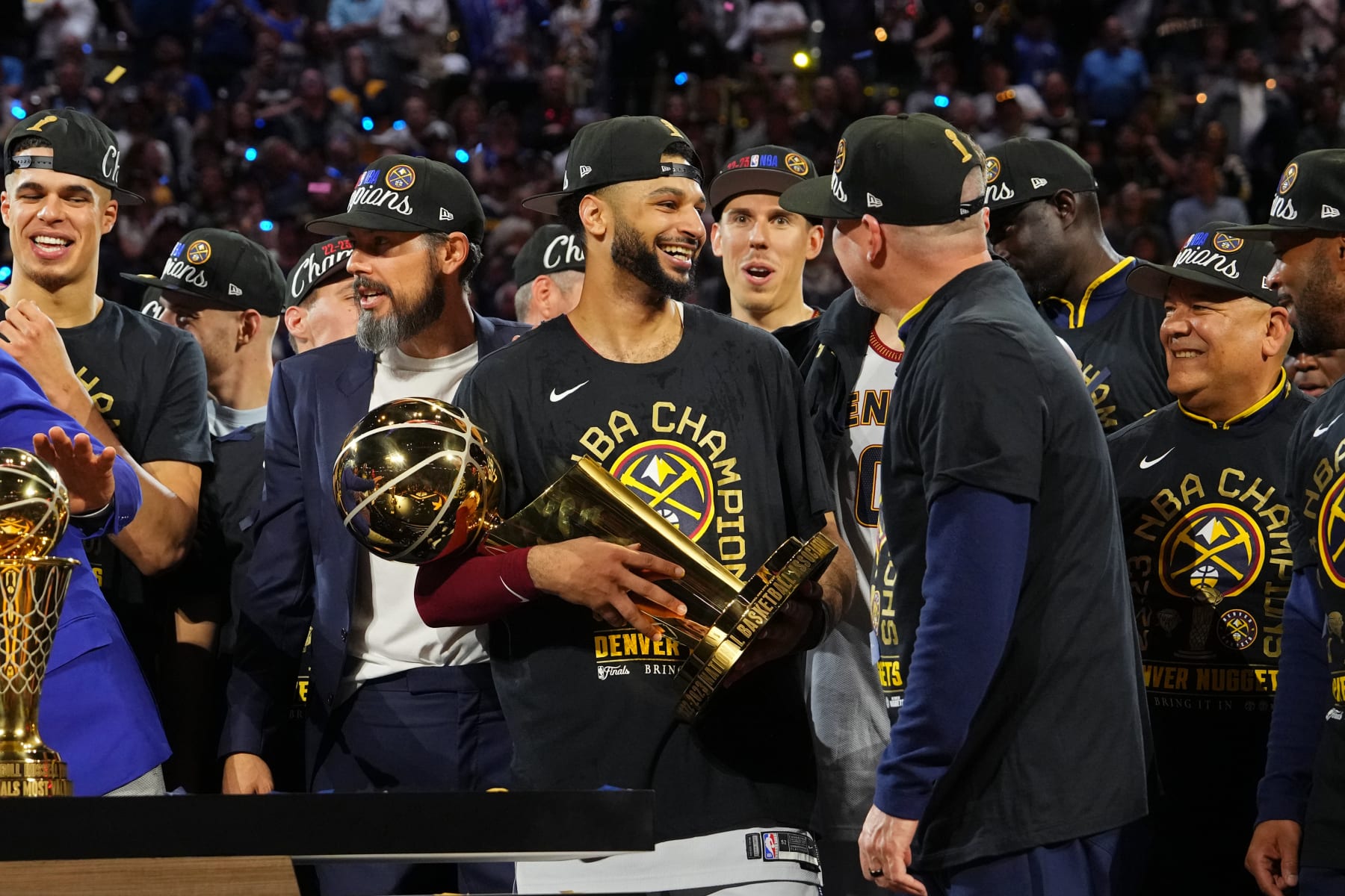 DENVER, CO - JUNE 12: Jamal Murray #27 of the Denver Nuggets holds the Larry O'Brien trophy after winning Game Five of the 2023 NBA Finals on June 12, 2023 at Ball Arena in Denver, Colorado. NOTE TO USER: User expressly acknowledges and agrees that, by downloading and or using this Photograph, user is consenting to the terms and conditions of the Getty Images License Agreement. Mandatory Copyright Notice: Copyright 2023 NBAE (Photo by Jesse D. Garrabrant/NBAE via Getty Images)