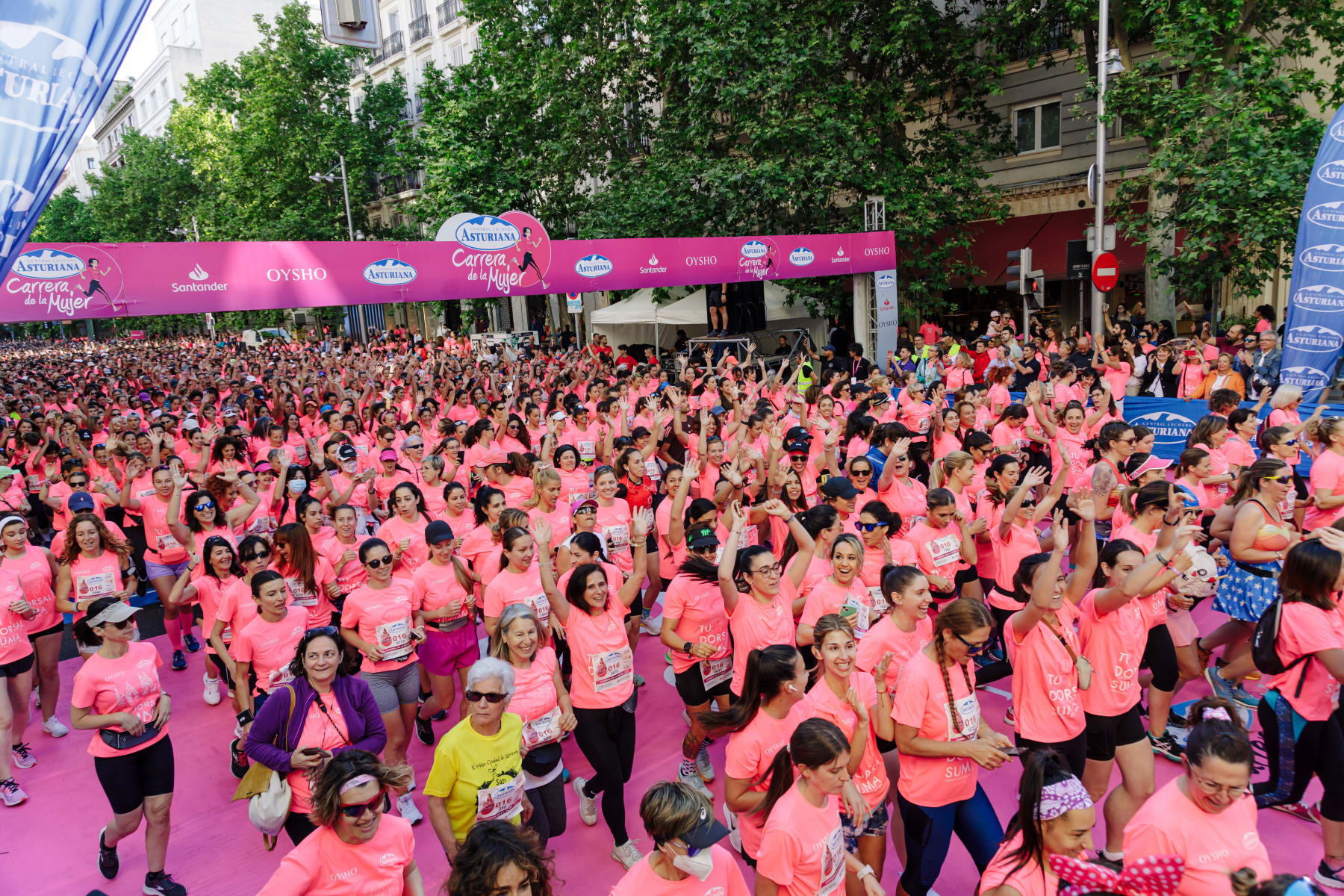 MADRID, SPAIN - MAY 07: Thousands of people participate in the nineteenth edition of the Madrid Women's Race 2023, on May 7, 2023, in Madrid, Spain. Madrid is once again hosting the Central Lechera Asturiana Women's Race to coincide with Mother's Day. This is one of the most popular races in the European calendar, combining sport and social commitment, with all runners wearing a pink T-shirt with the number 016, the telephone number for abused women. In total, 35,000 women will be able to be at the starting line to cover the 7.2 kilometers of route that connects Serrano Street with Paseo de Camoens. It is the largest women's sporting event in Europe. (Photo By Carlos Lujan/Europa Press via Getty Images)