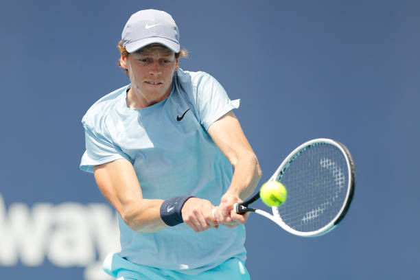 MIAMI GARDENS, FLORIDA - APRIL 02: Jannik Sinner of Italy returns a shot to Roberto Bautista Agut of Spain in their semifinal match during the Miami Open at Hard Rock Stadium on April 02, 2021 in Miami Gardens, Florida. (Photo by Michael Reaves/Getty Images)