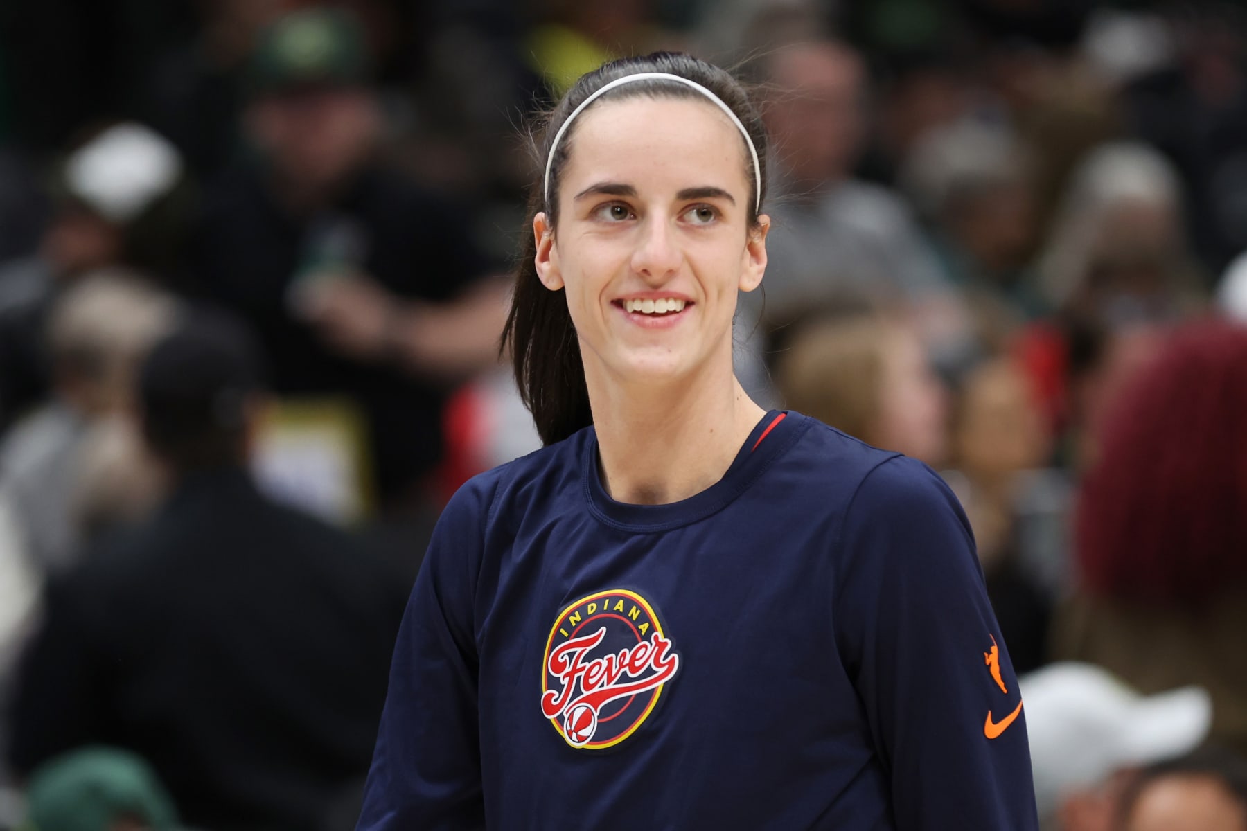 SEATTLE, WASHINGTON - MAY 22: Caitlin Clark #22 of the Indiana Fever reacts prior to a game against the Seattle Storm in the game at Climate Pledge Arena on May 22, 2024 in Seattle, Washington. NOTE TO USER: User expressly acknowledges and agrees that, by downloading and or using this photograph, User is consenting to the terms and conditions of the Getty Images License Agreement. (Photo by Steph Chambers/Getty Images)