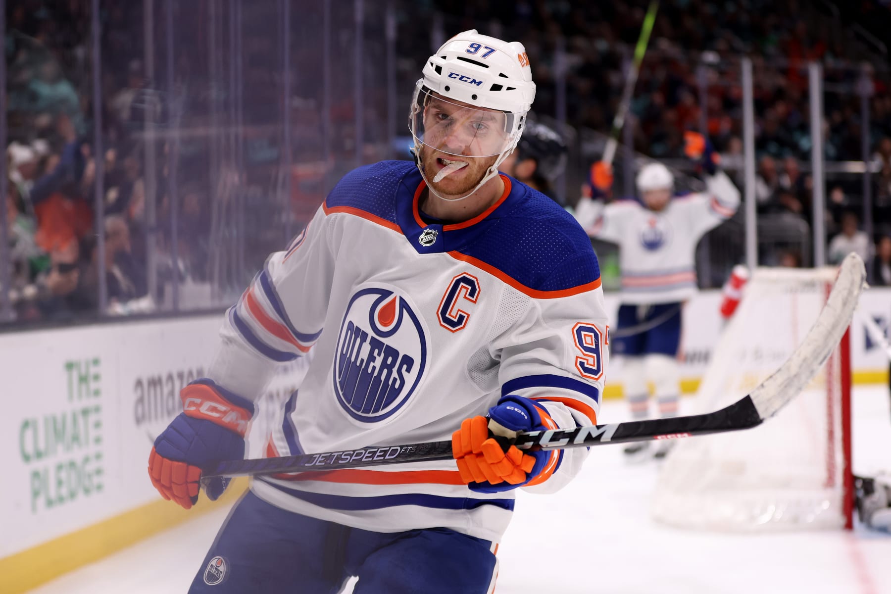 SEATTLE, WASHINGTON - MARCH 18: Connor McDavid #97 of the Edmonton Oilers celebrates his goal against the Seattle Kraken during the third period at Climate Pledge Arena on March 18, 2023 in Seattle, Washington. (Photo by Steph Chambers/Getty Images)