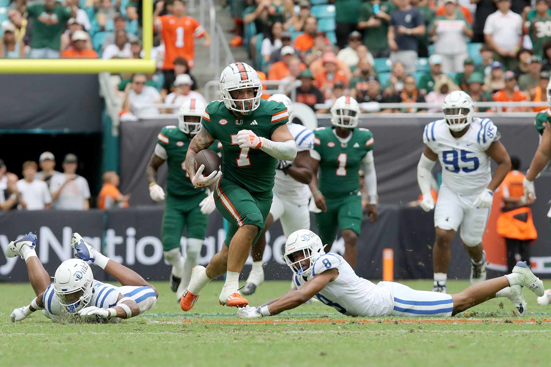Xavier Restrepo #7 of the Miami Hurricanes