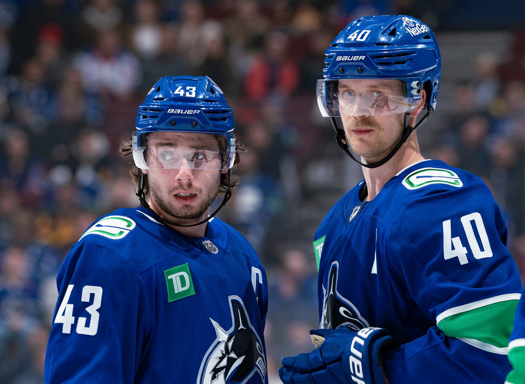 Quinn Hughes and Elias Pettersson.