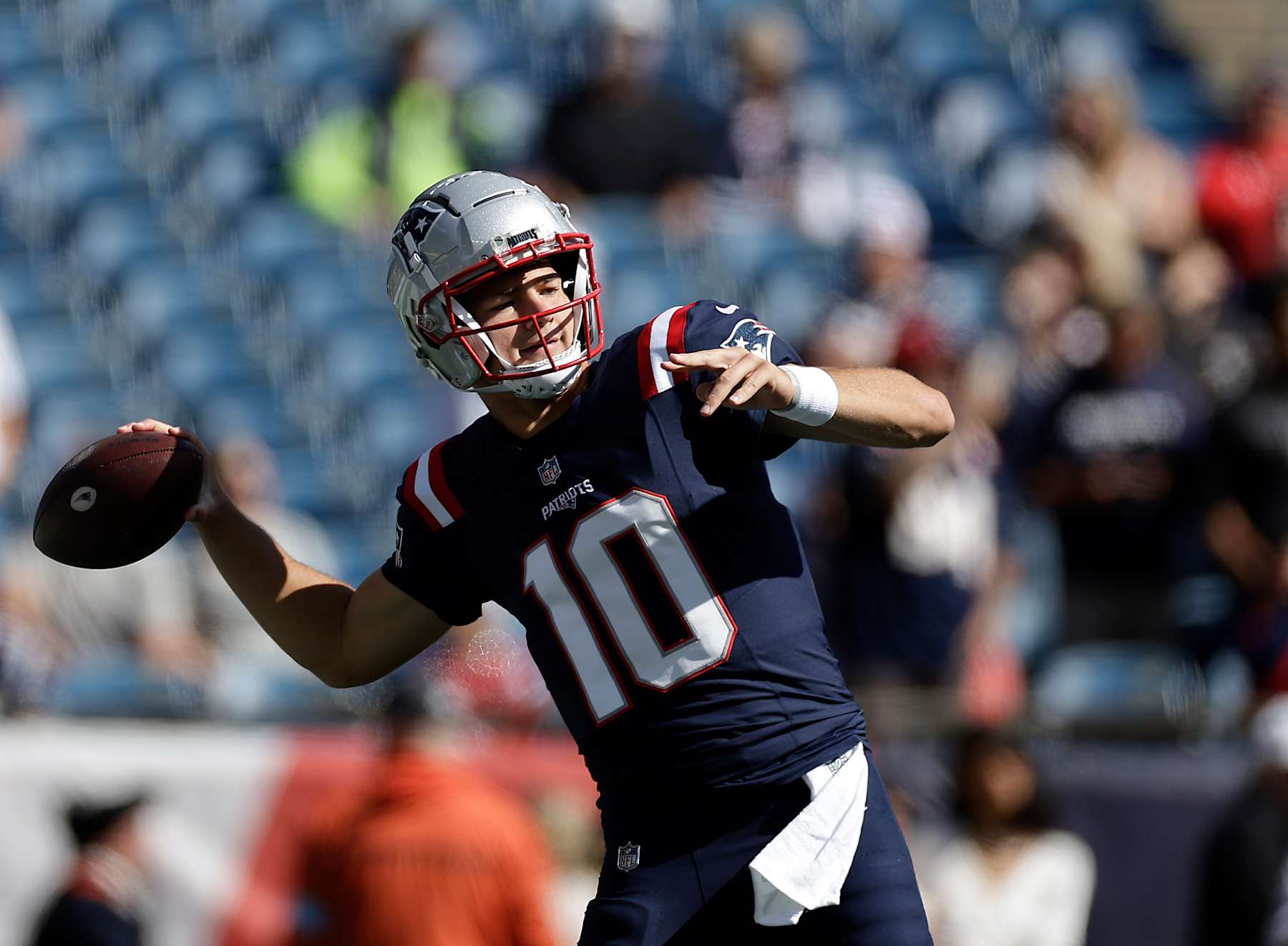 FOXBOROUGH, MASSACHUSETTS - OCTOBER 06: Quarterback 
Drake Maye #10 of the New England Patriots warms up prior to a game against the Miami Dolphins at Gillette Stadium on October 06, 2024 in Foxborough, Massachusetts. (Photo by Adam Hunger/Getty Images)